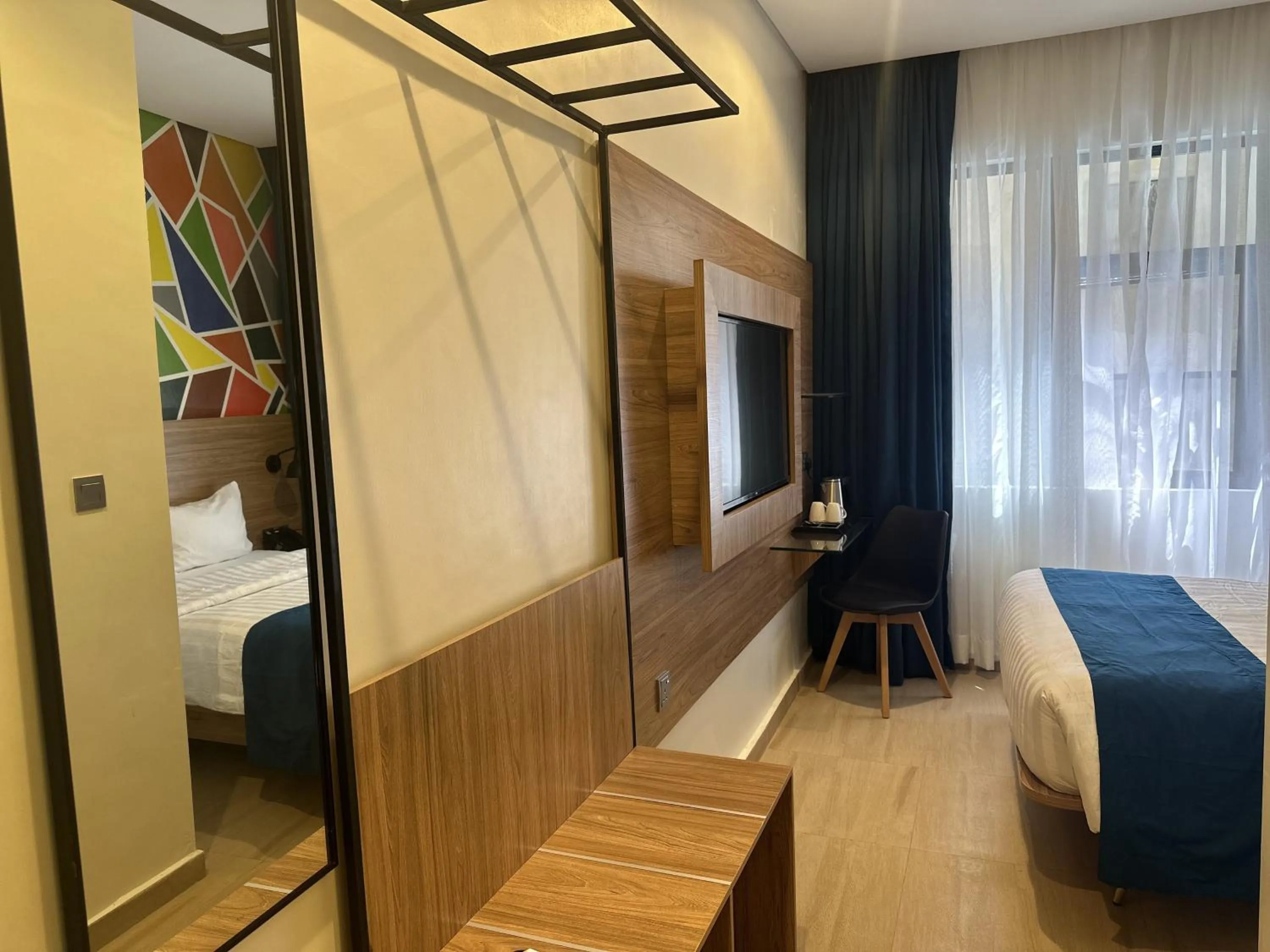 TV and multimedia, Bed in Hotelinn Oniru