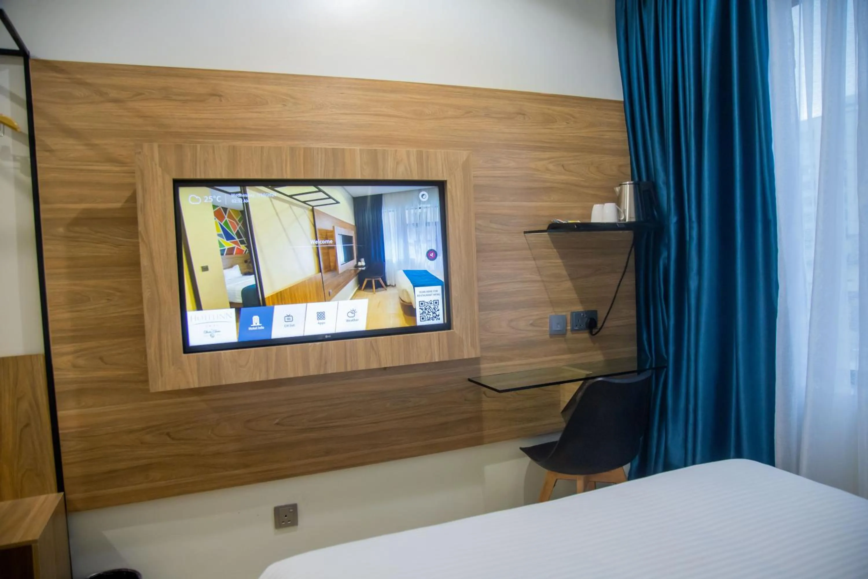 TV and multimedia, Bed in Hotelinn Oniru