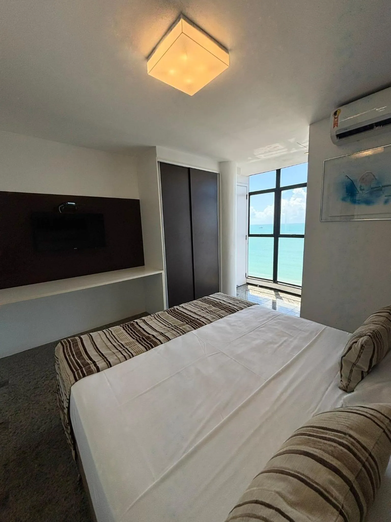 View (from property/room), Bed in Hotel Brasil Tropical