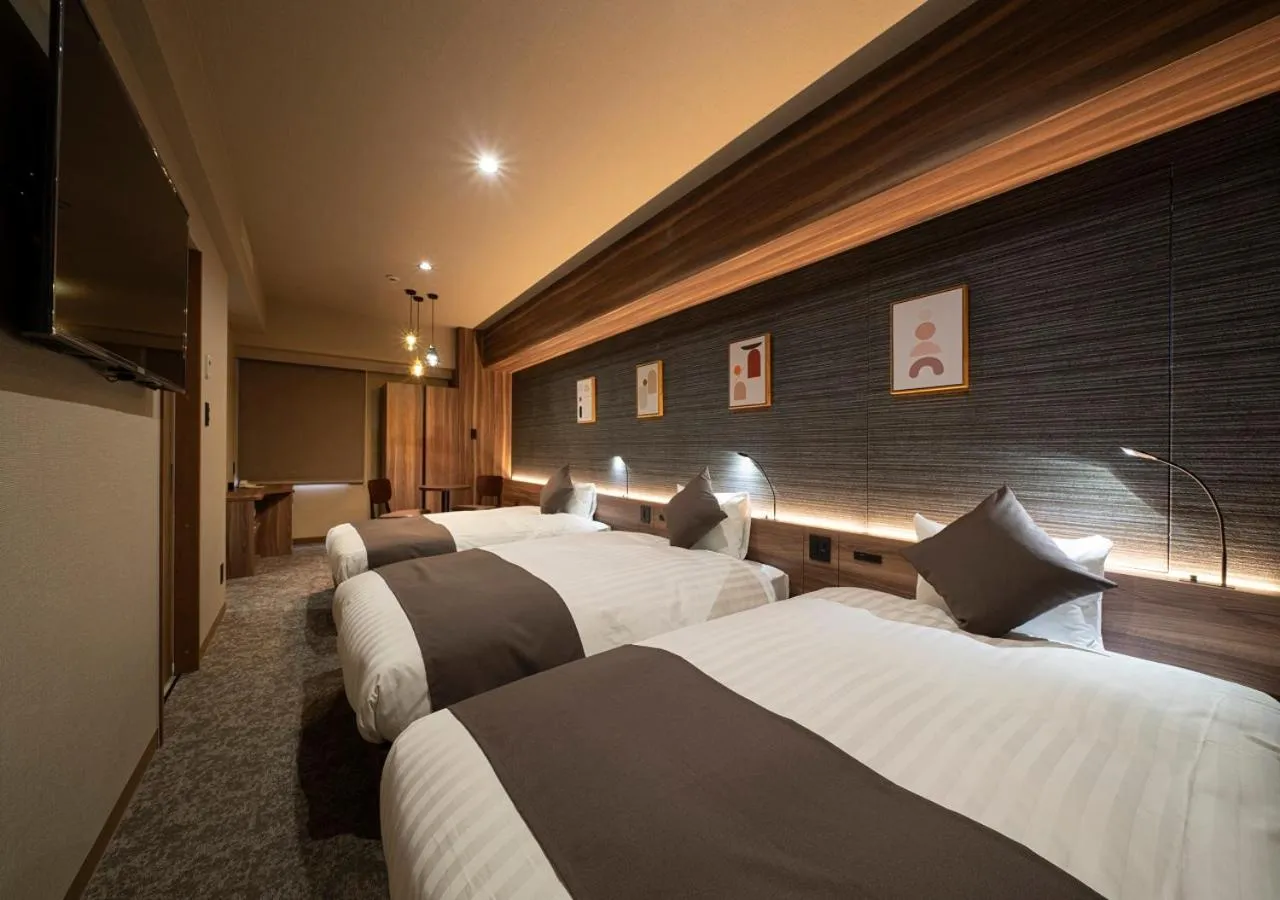 Bed in Nagoya B's Hotel