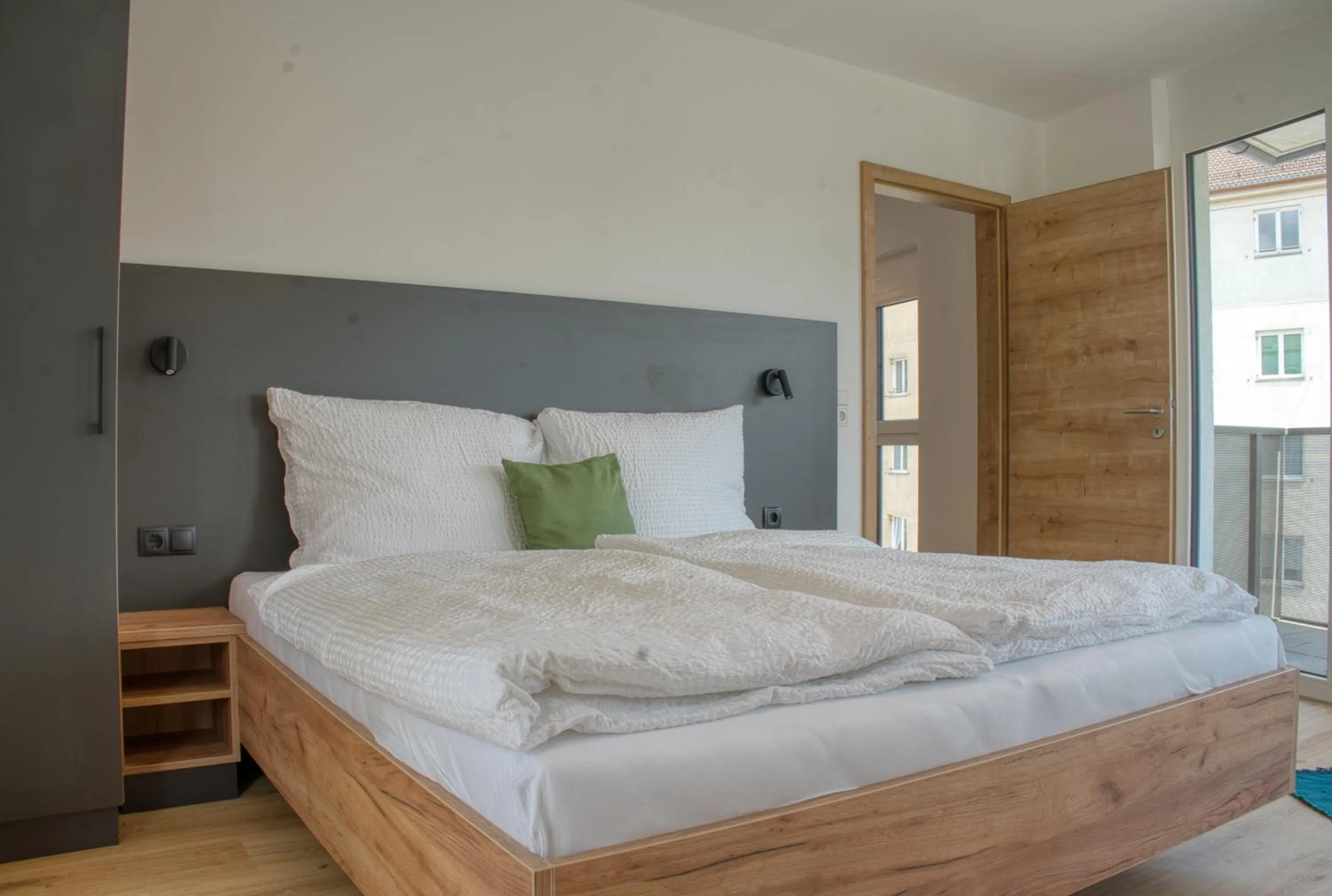 Bed in myQuartier City Chalets digital self check in