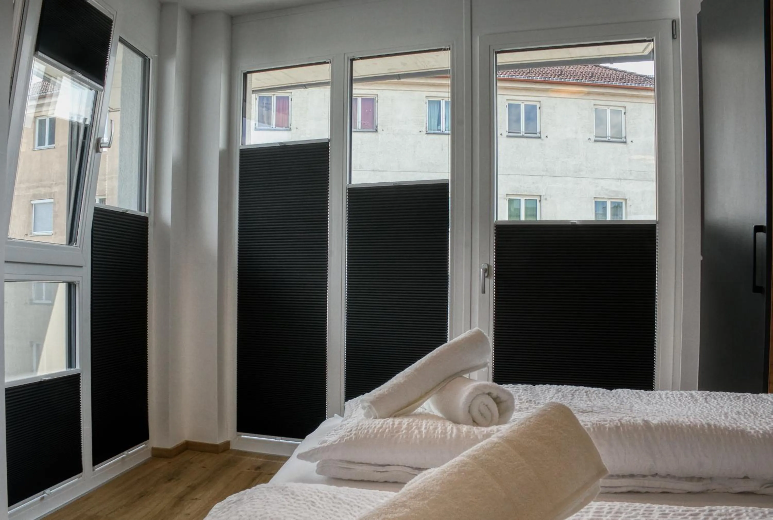 Bed in myQuartier City Chalets digital self check in