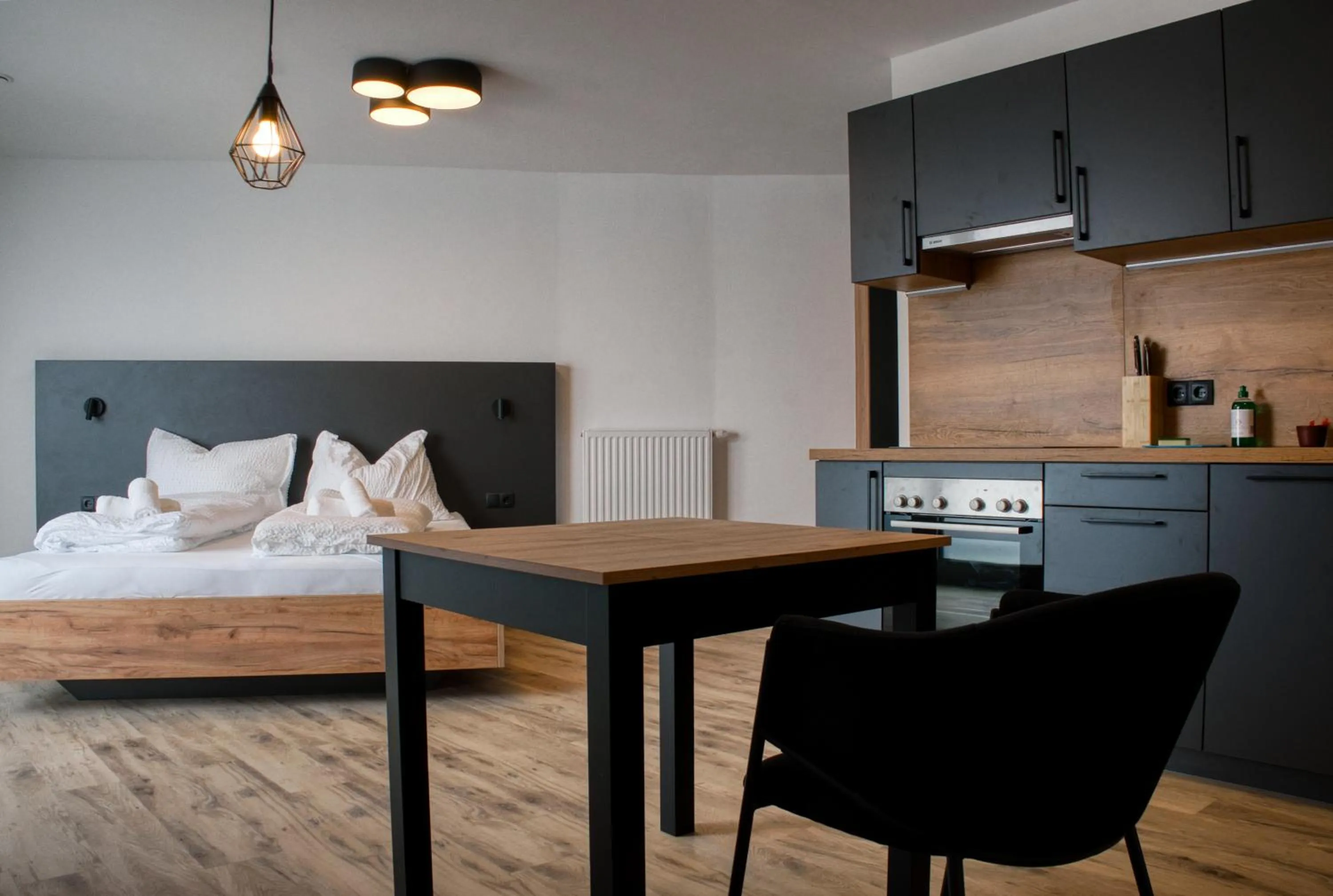 Bed in myQuartier City Chalets digital self check in