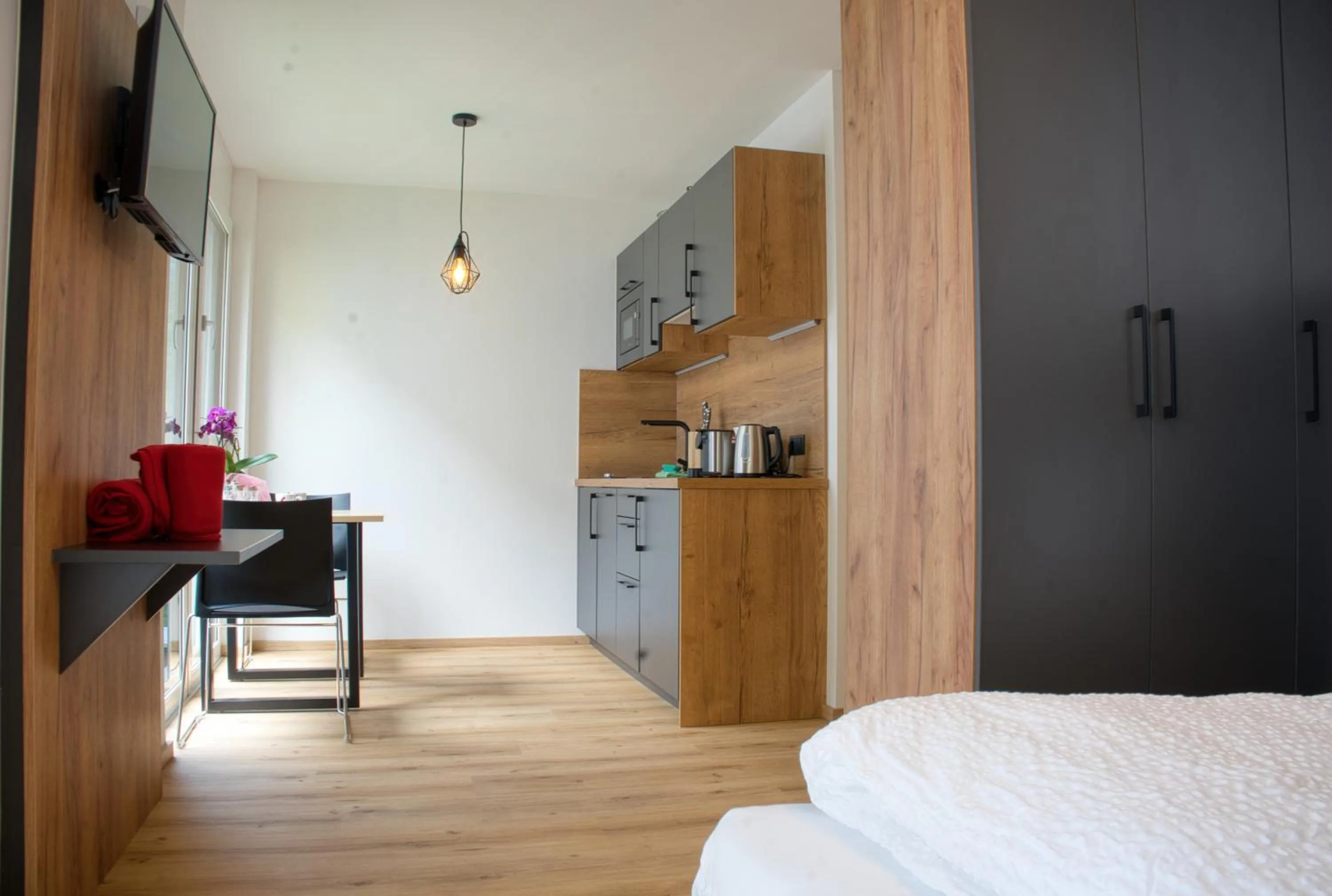 Bed in myQuartier City Chalets digital self check in