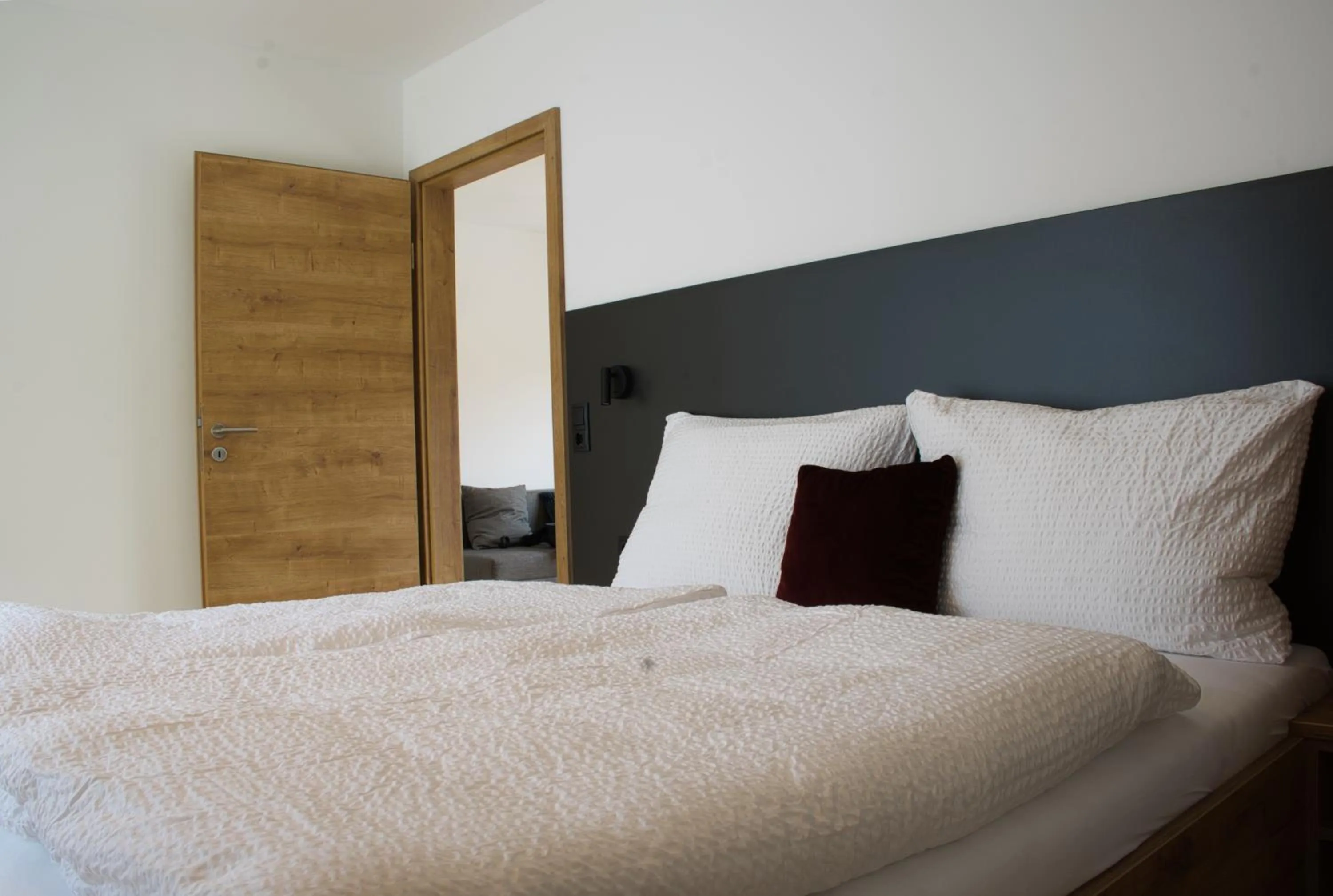 Bed in myQuartier City Chalets digital self check in