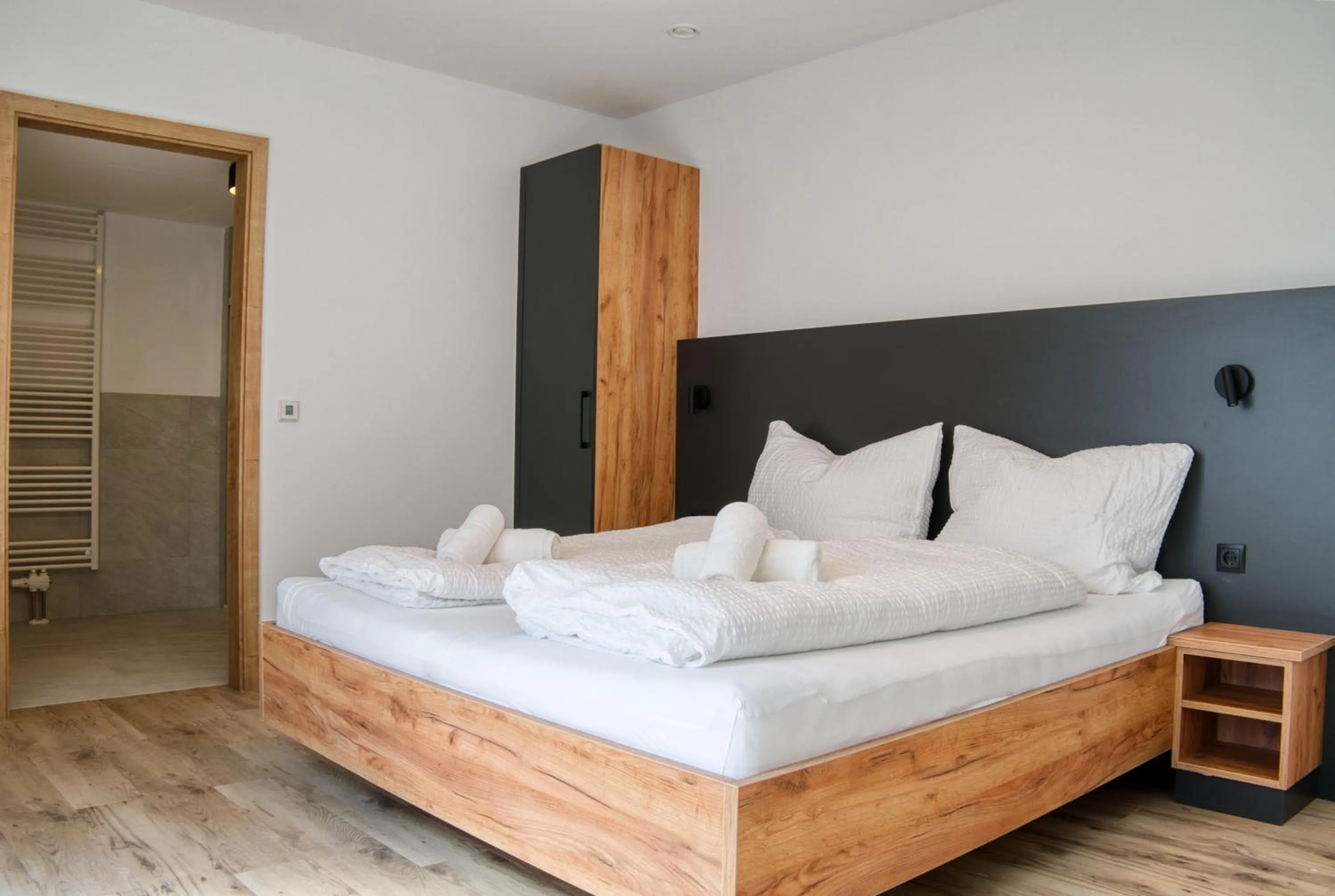 Bed in myQuartier City Chalets digital self check in