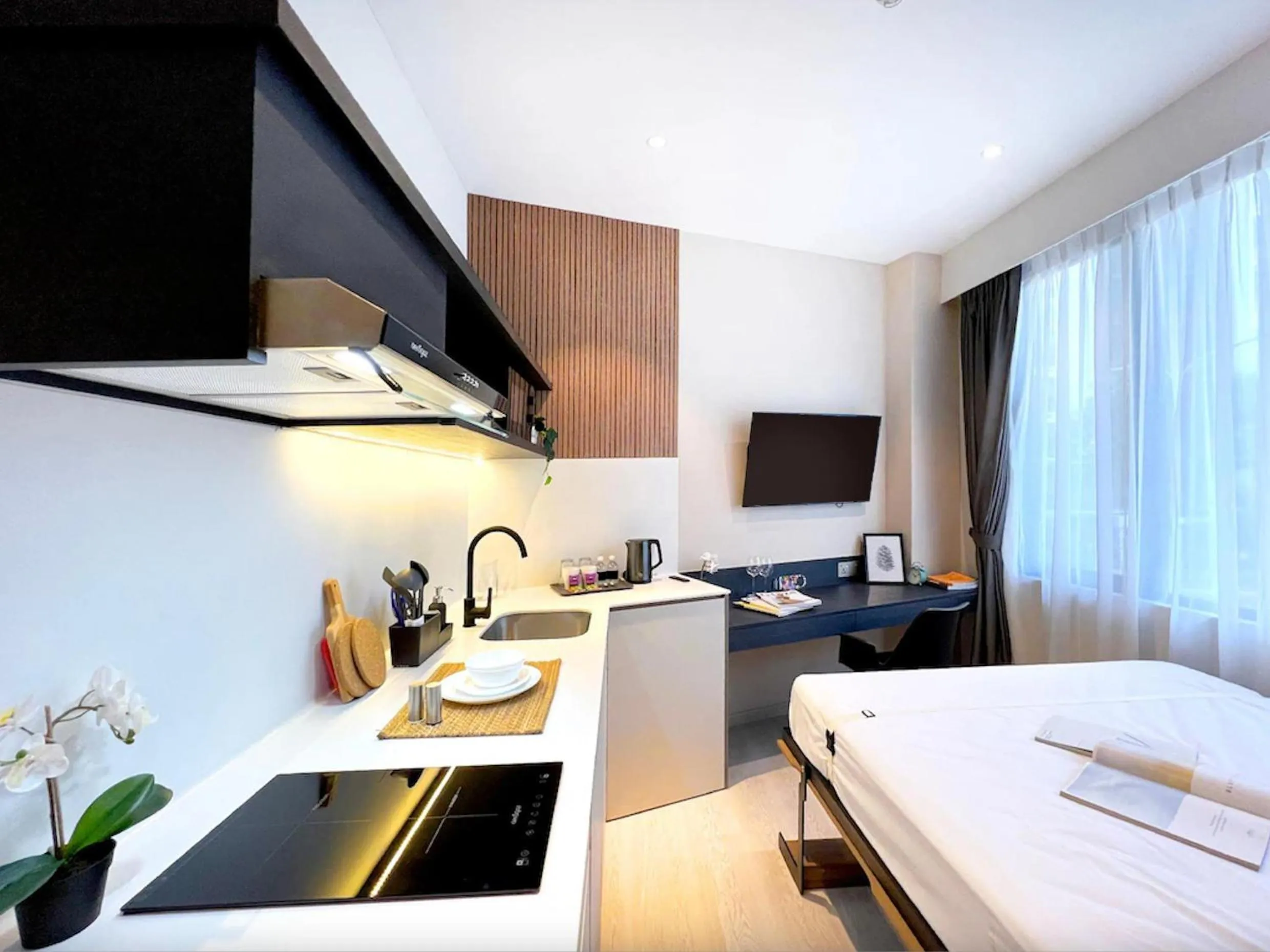 Kitchen or kitchenette, Bed in Habyt Studios at Novena