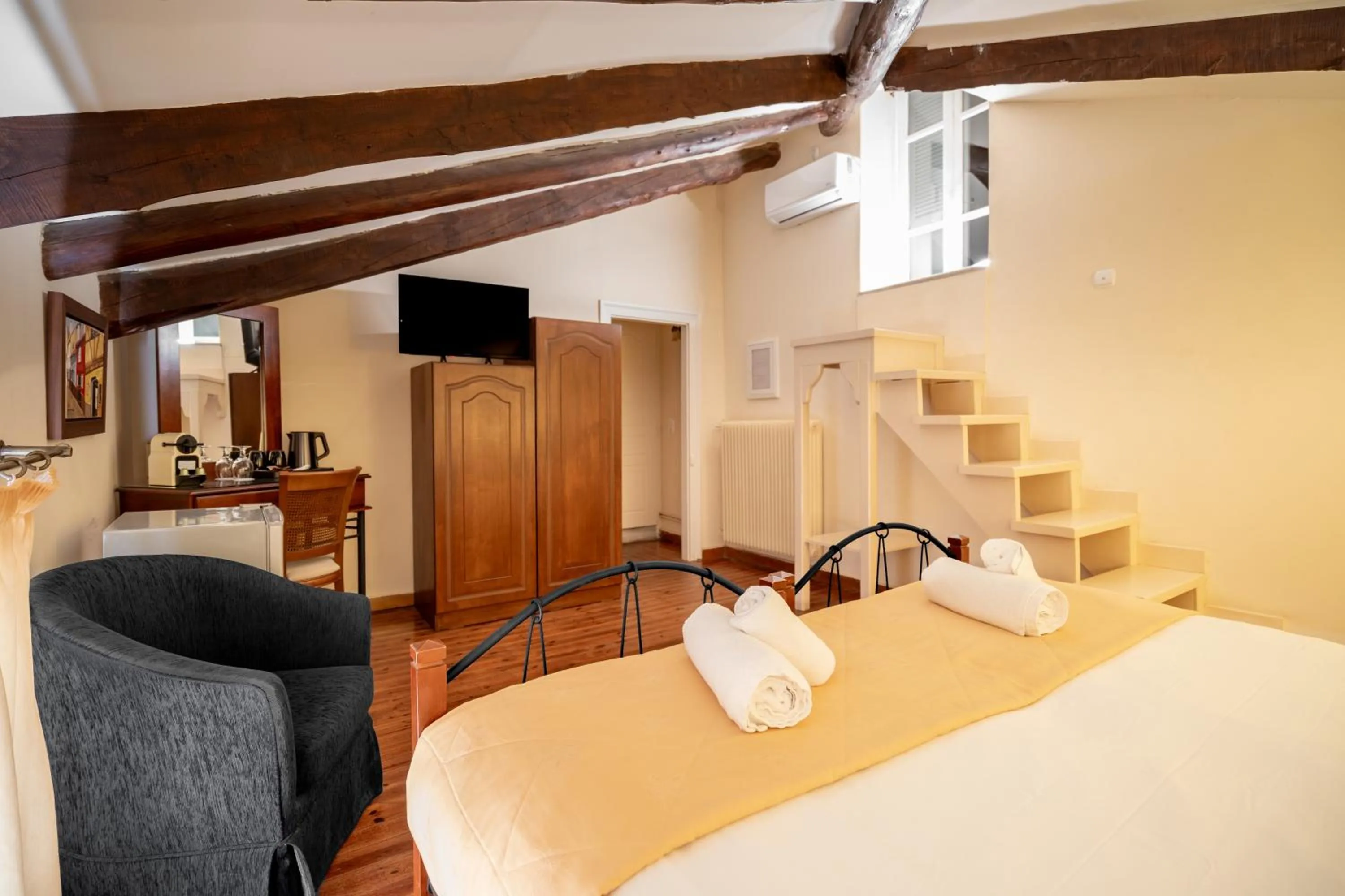 Bed in Archontiko Eleni Hotel