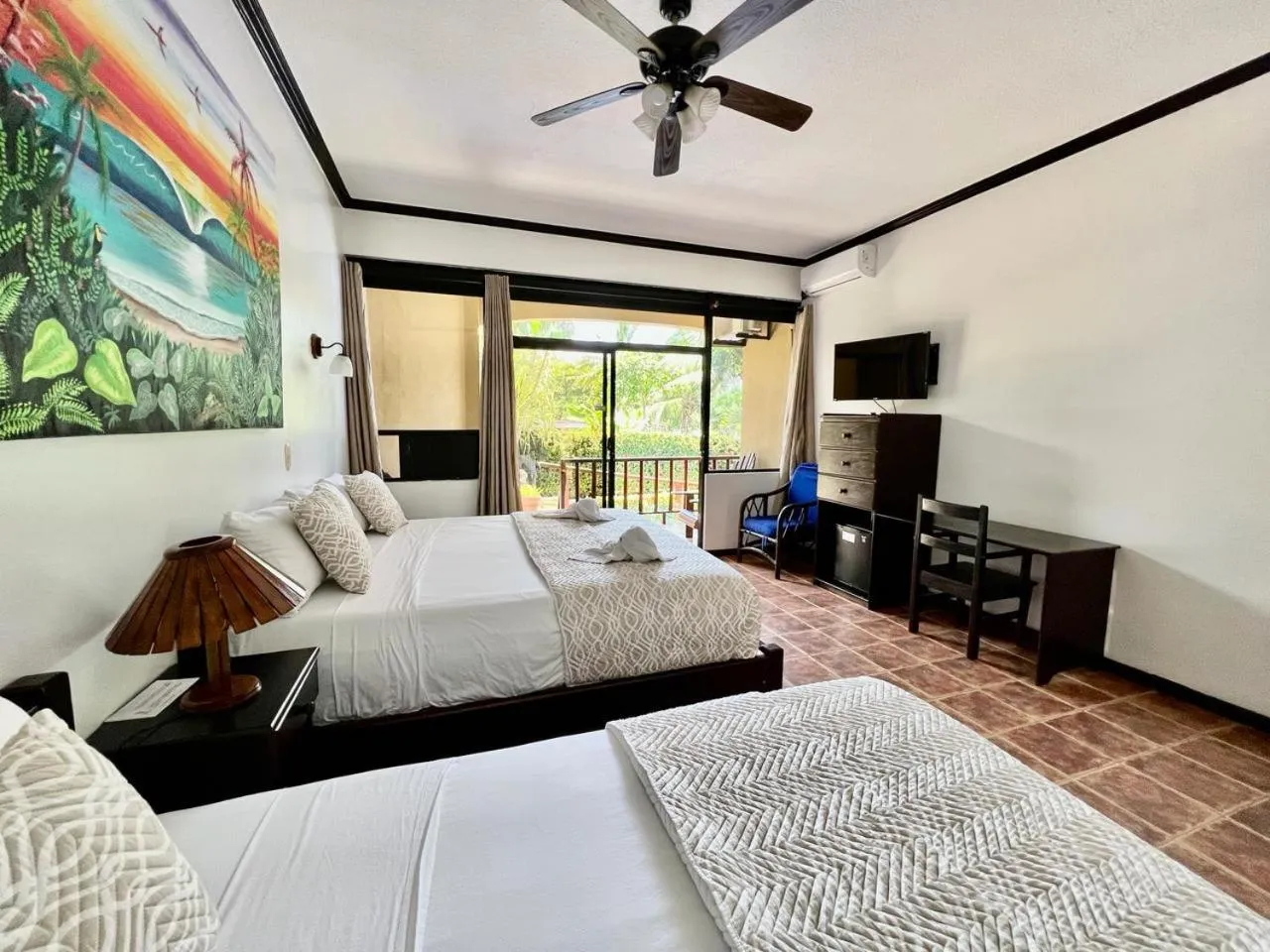 Bed in The Backyard Beachfront Hotel