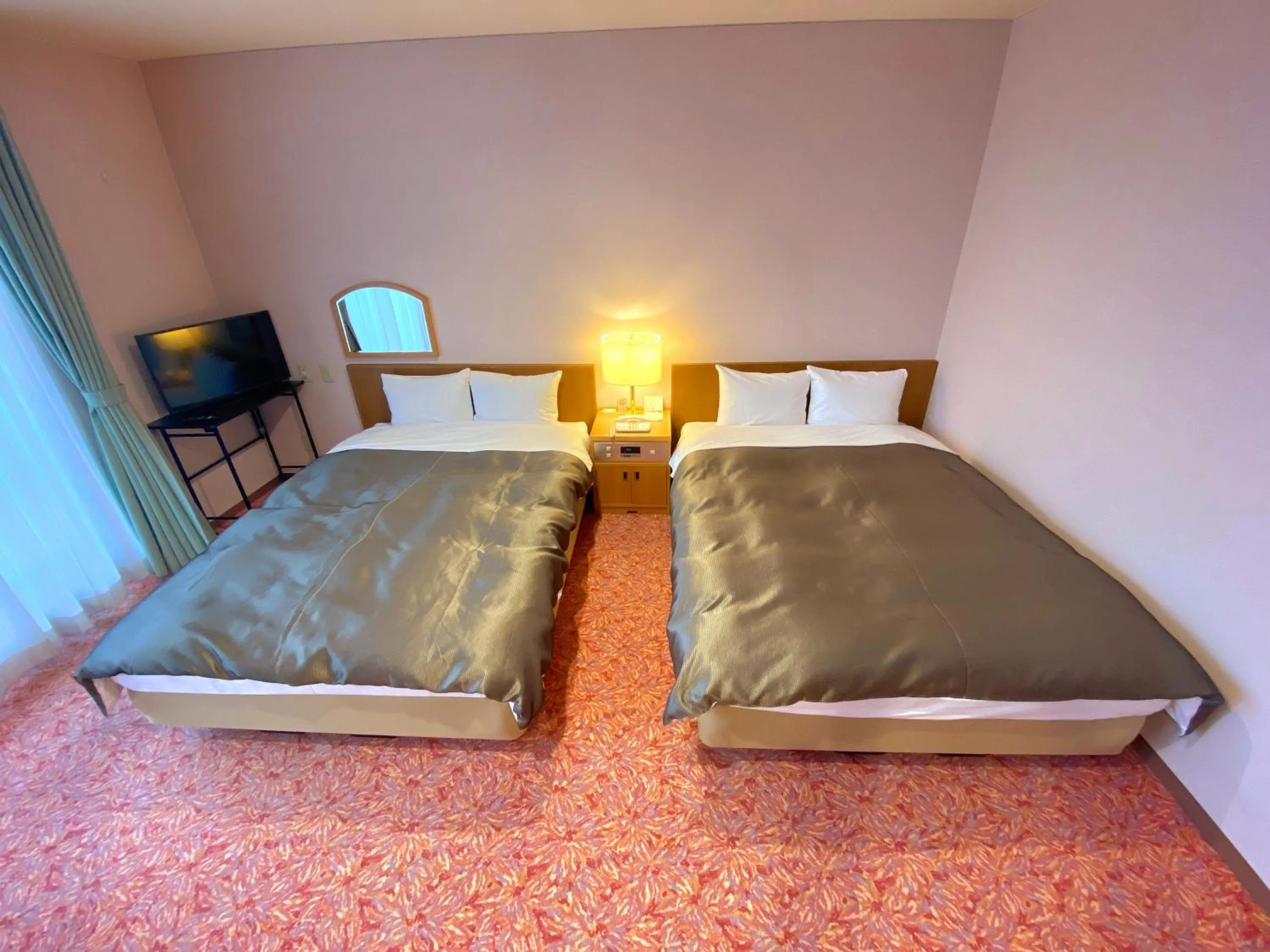 Bed in Hotel Lavenir