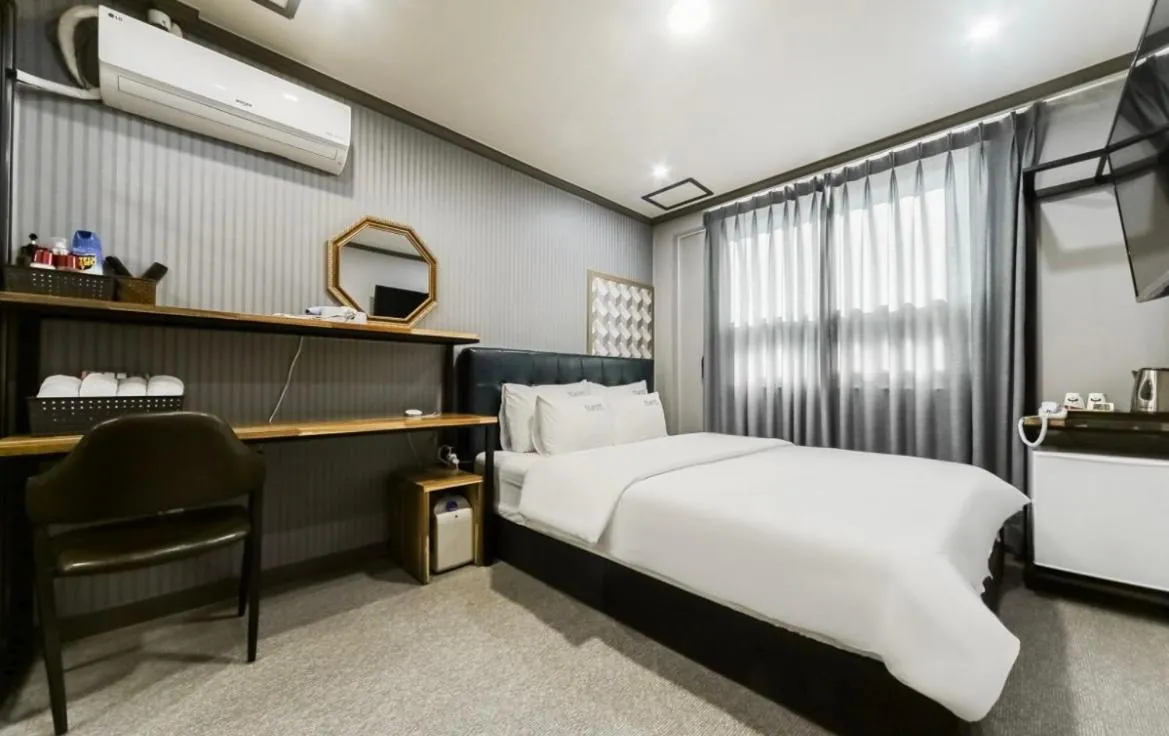 Bed in The Sharp Hotel