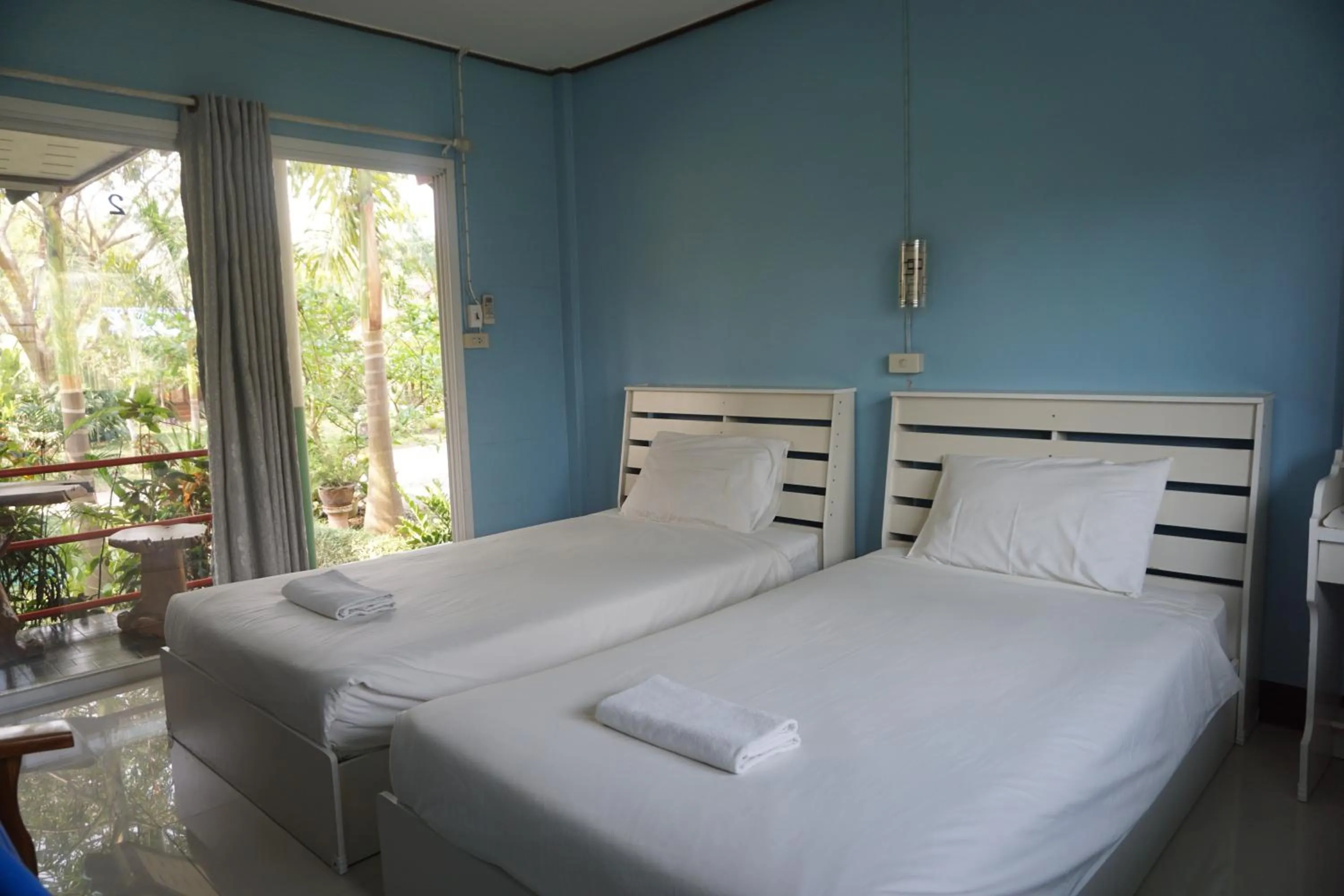 Bed in Samnaree Garden House