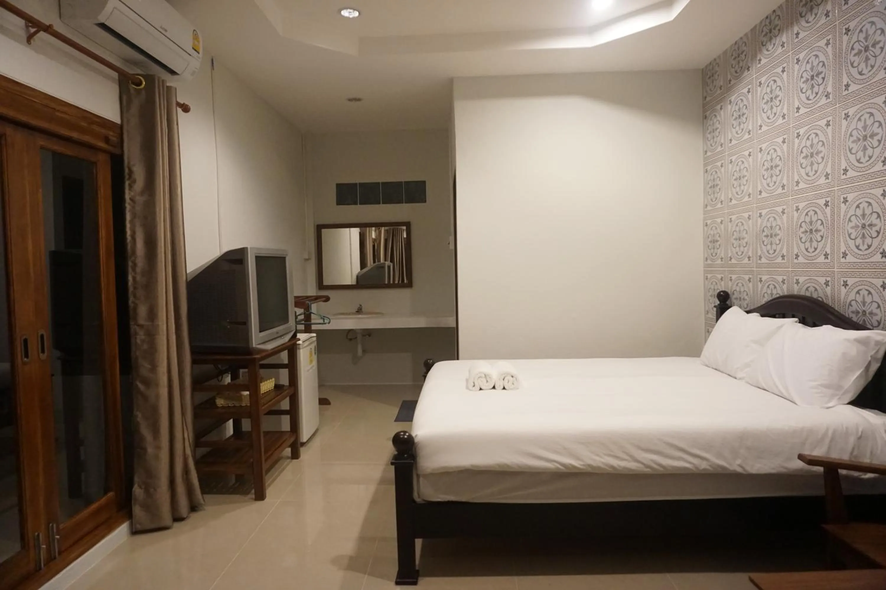 Bed in Samnaree Garden House