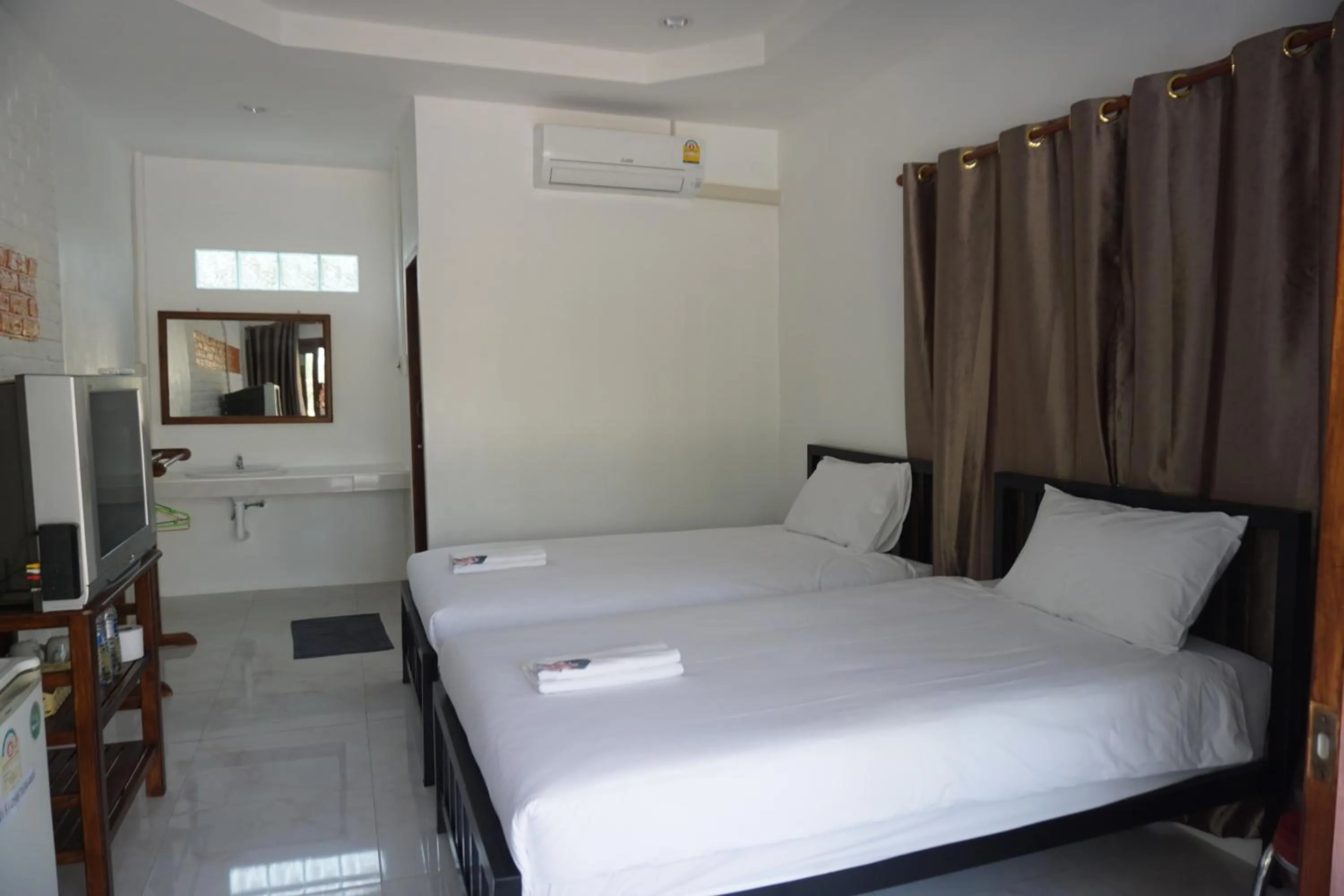 Bed in Samnaree Garden House