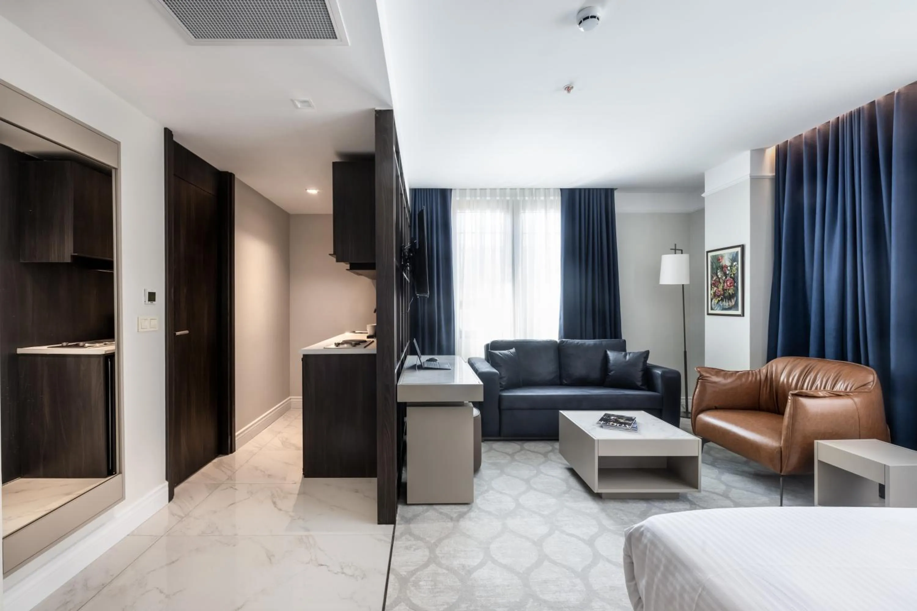 Seating area, Bed in Noble Pangaltı