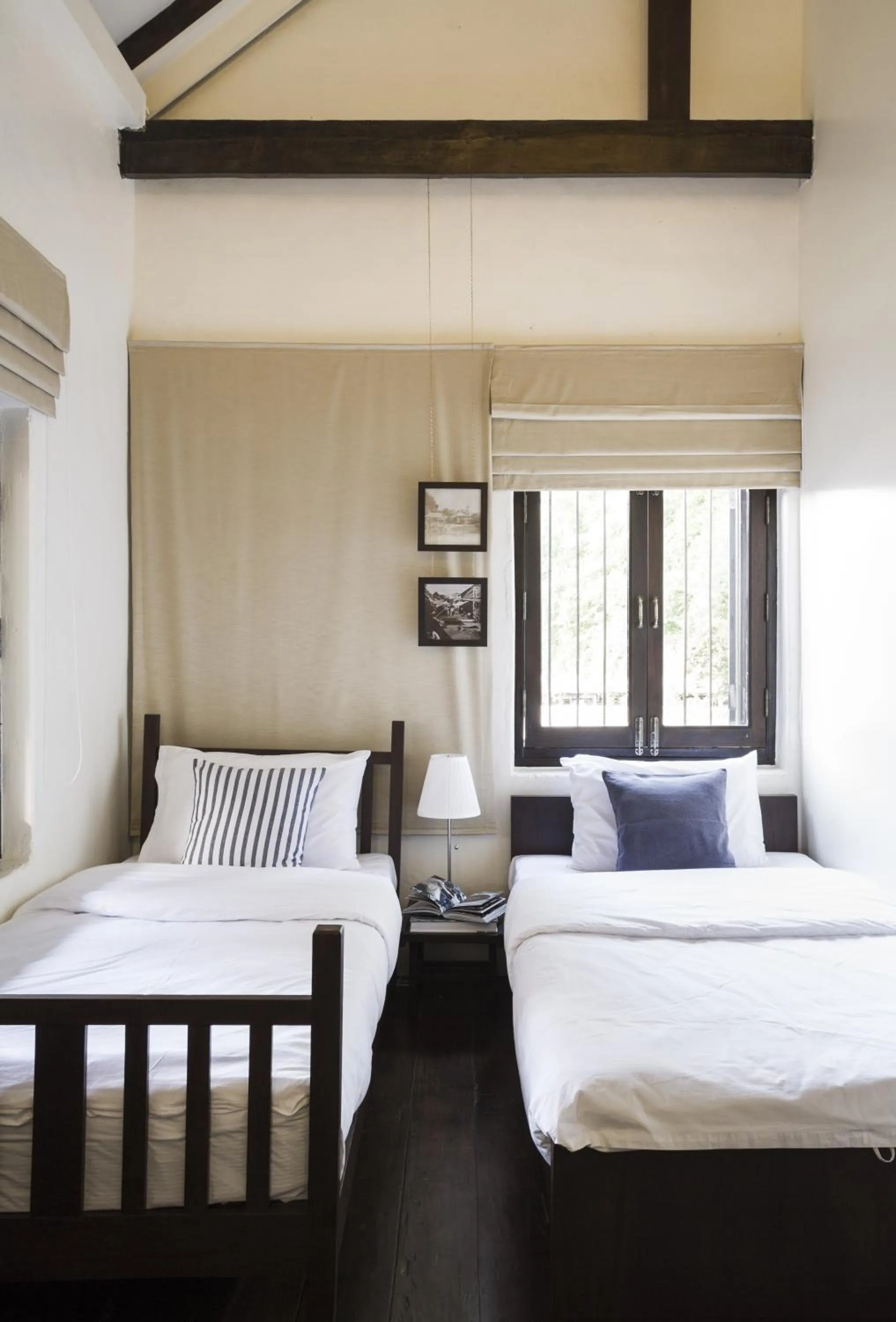 Bed in Baan Luang Rajamaitri Historic Inn