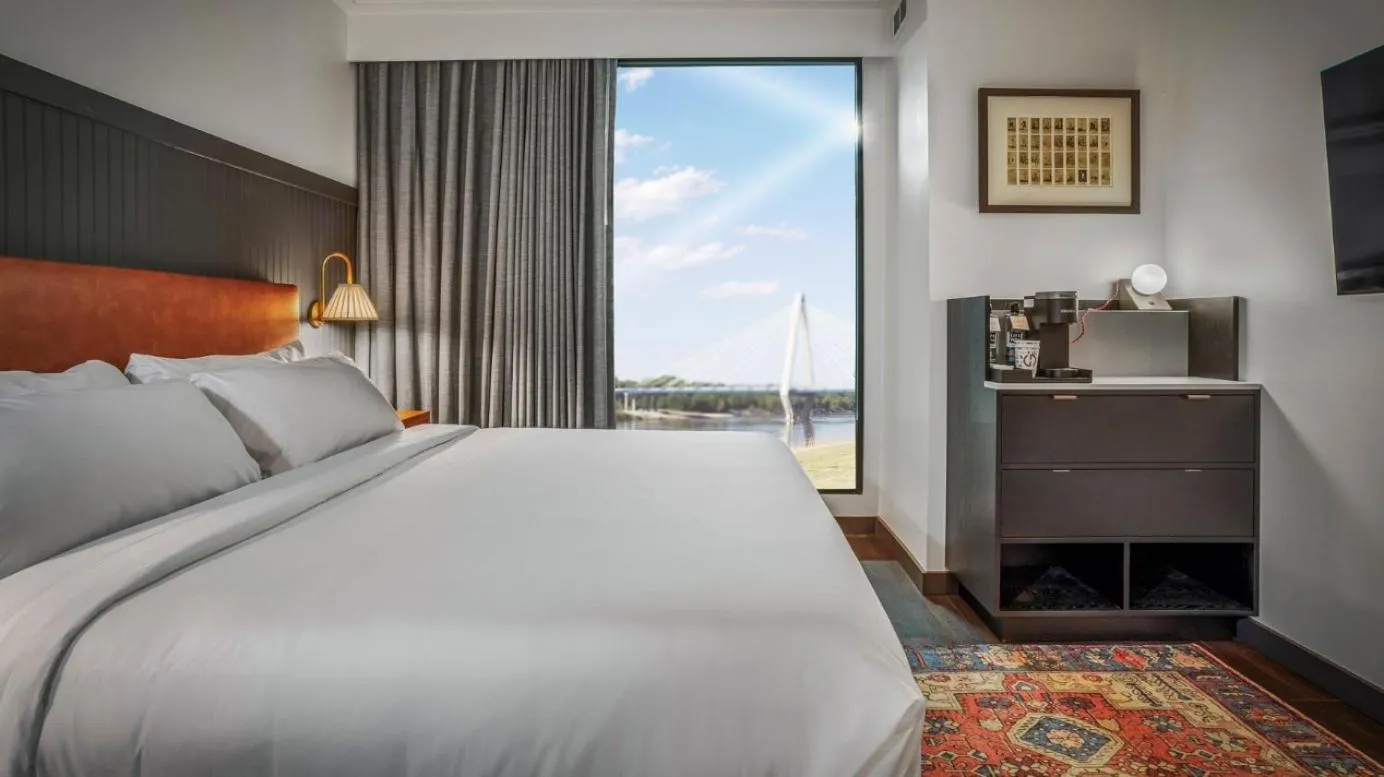 Bed in Origin Kansas City Riverfront, a Wyndham Hotel