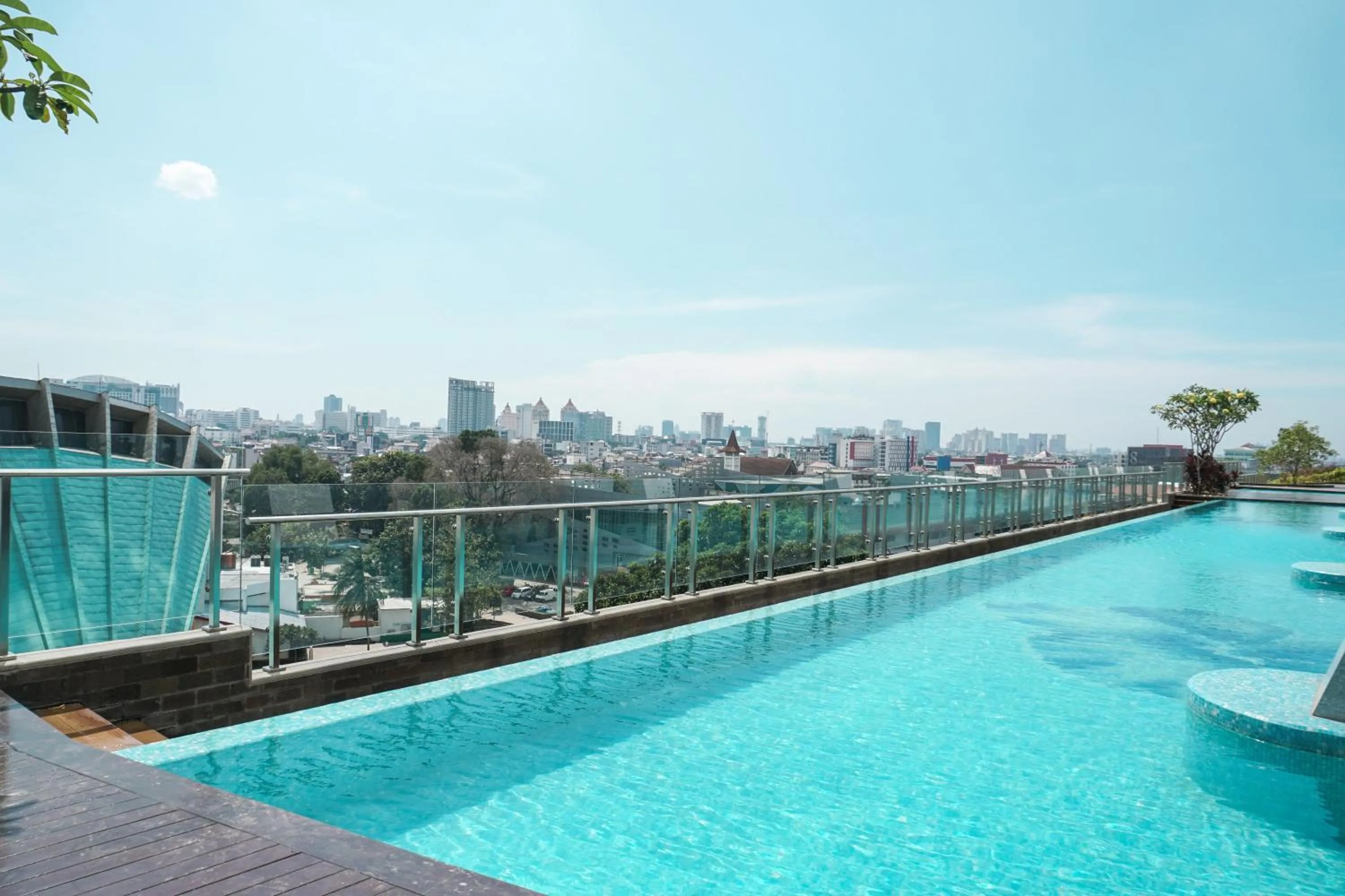 Swimming pool in Lovely Studio Menteng Park Apartment By Travelio