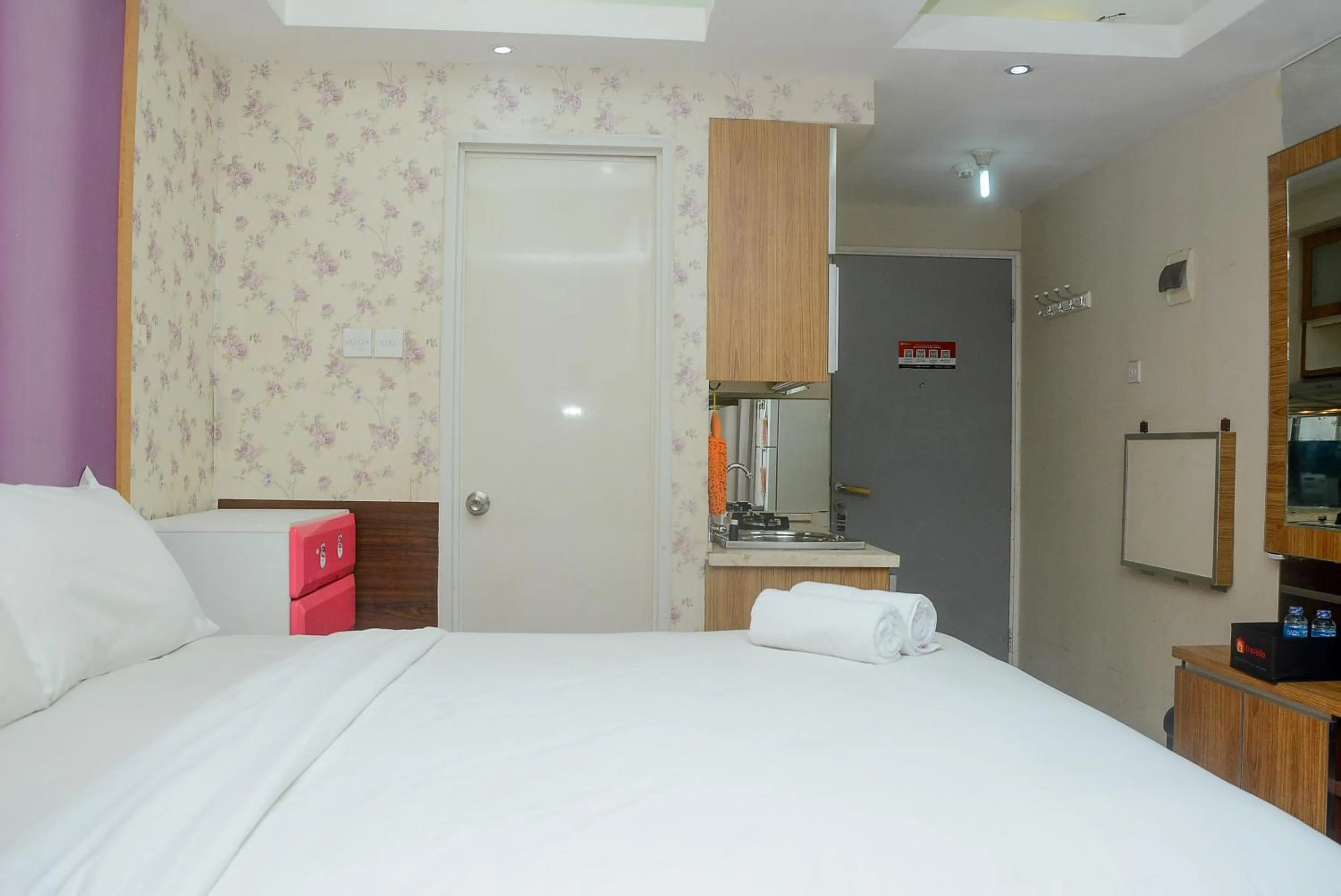 Bed in Homey Studio Pakubuwono Terrace Apartment By Travelio