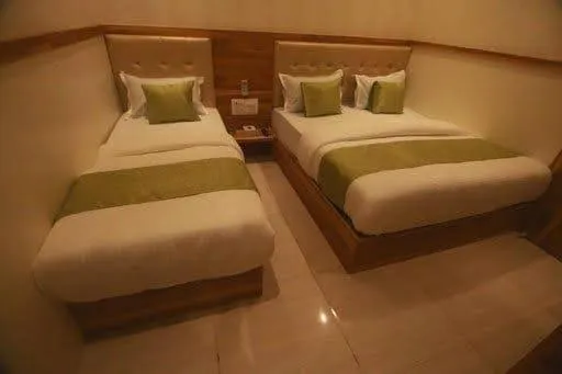 Bed in Hotel Al Madina palace
