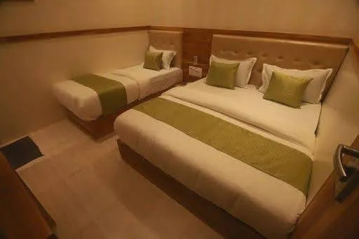 Bed in Hotel Al Madina palace