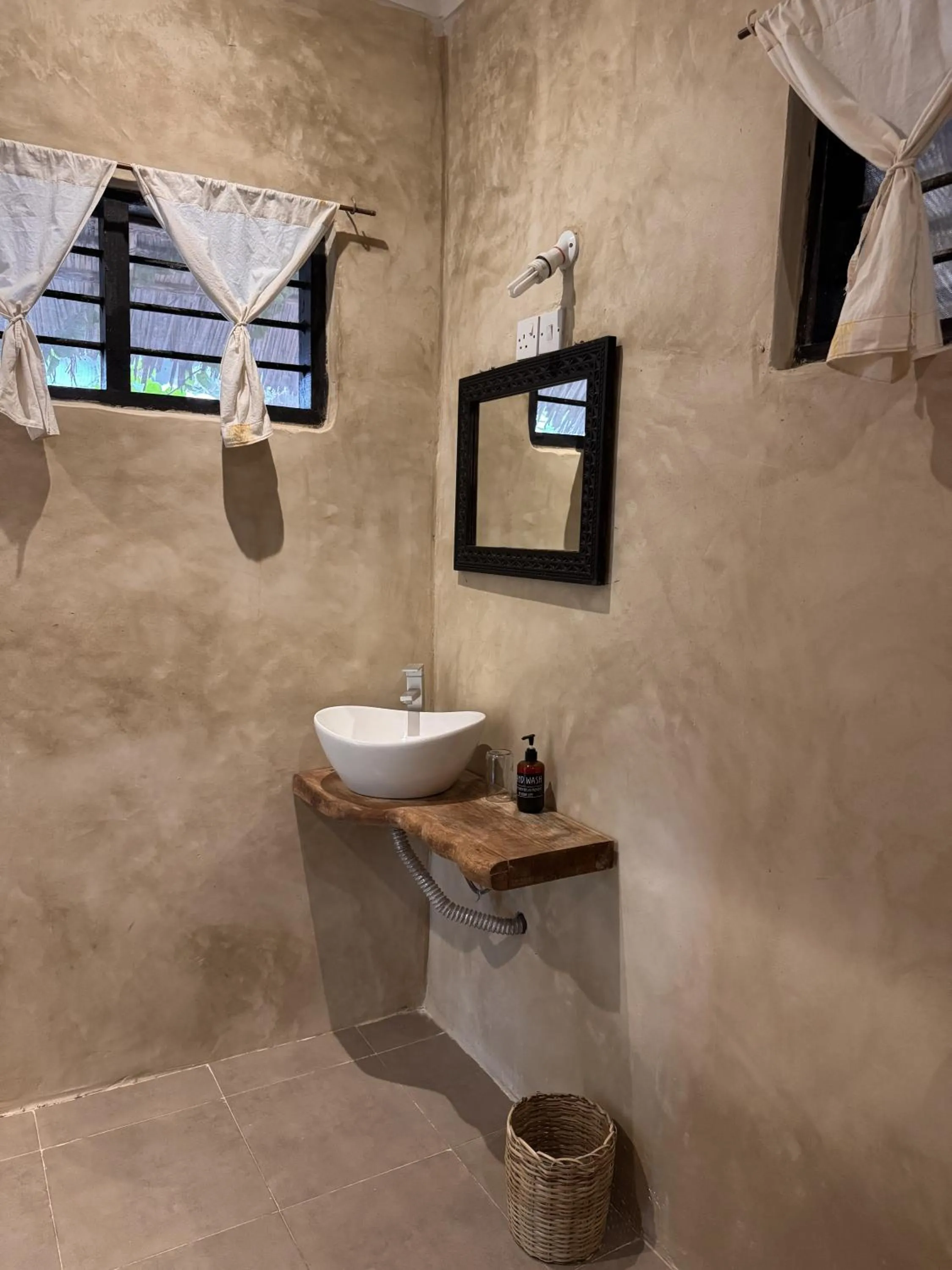 Bathroom in Paje By Night Bungalows