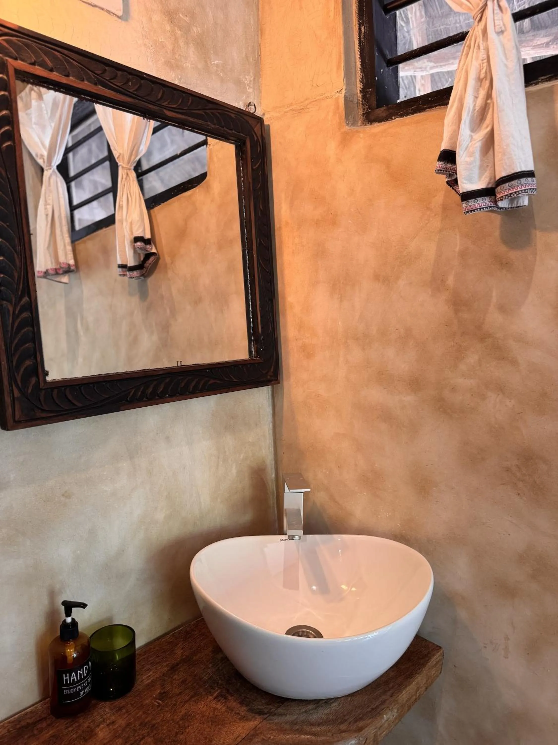 Bathroom in Paje By Night Bungalows