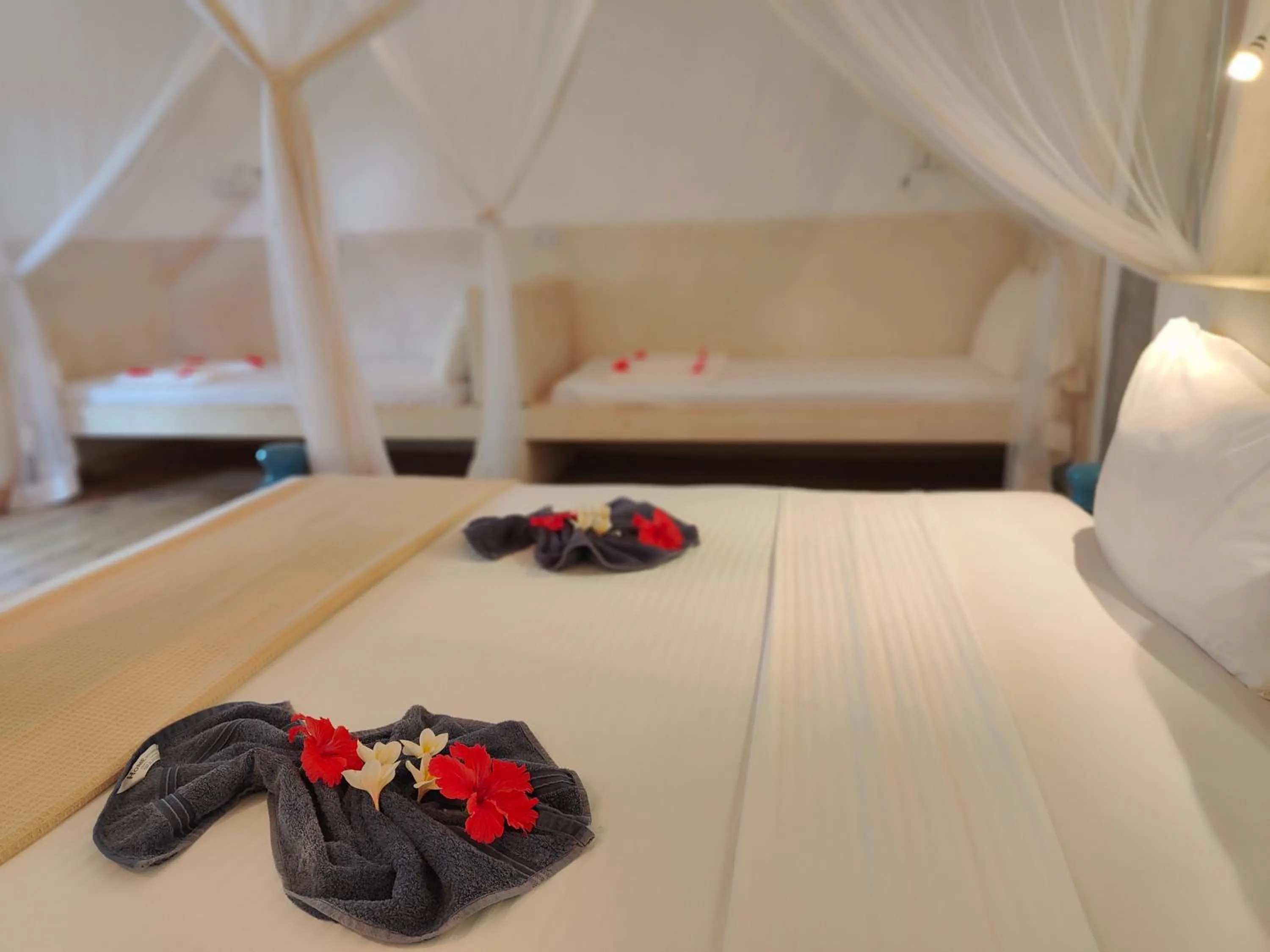 Bed in Paje By Night Bungalows