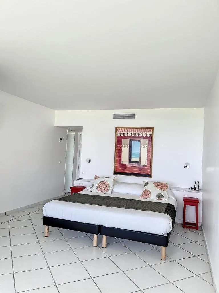 Bed in Le Domaine Anse Marcel Beach Resort