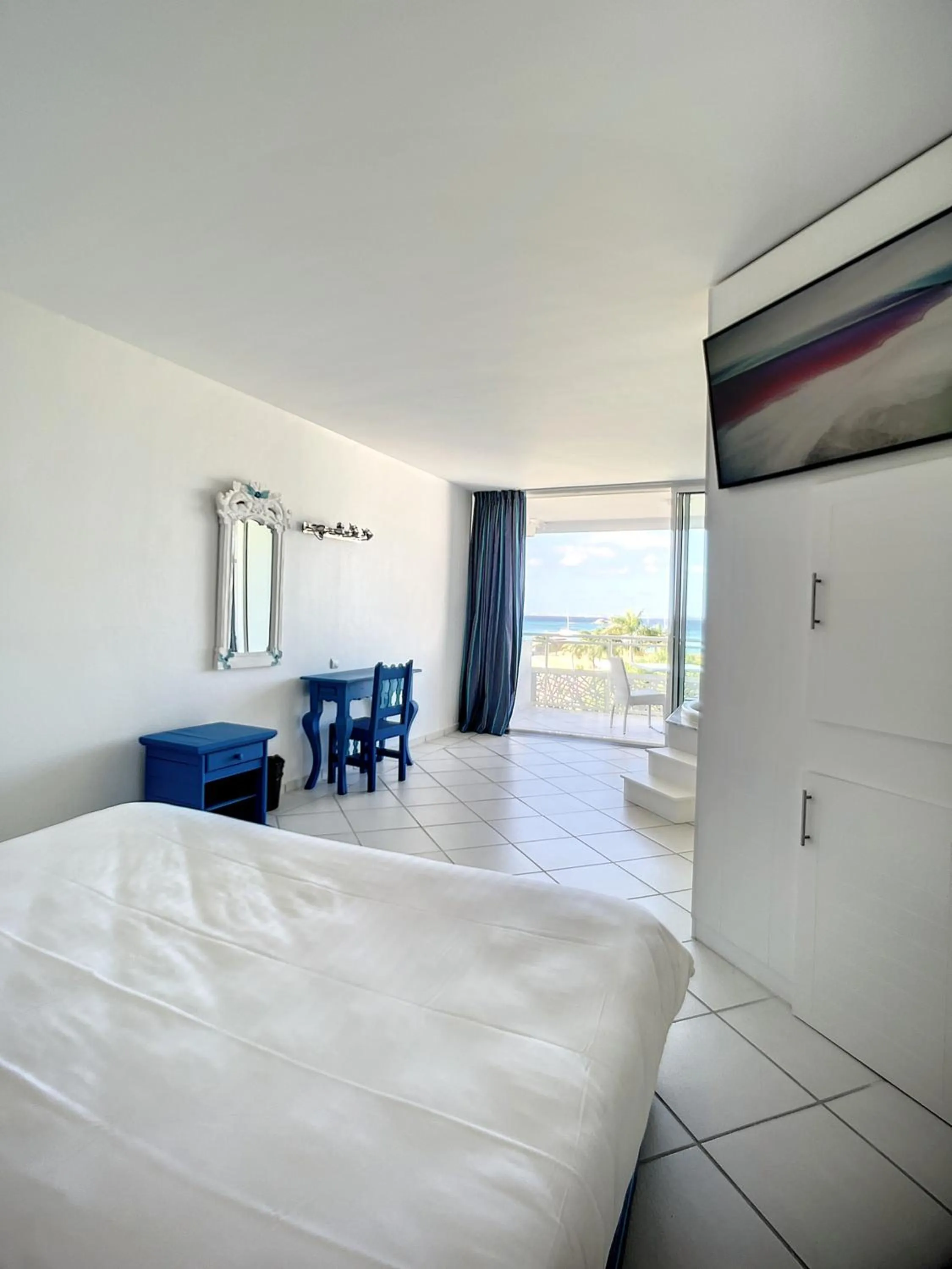 Property building, Bed in Le Domaine Anse Marcel Beach Resort