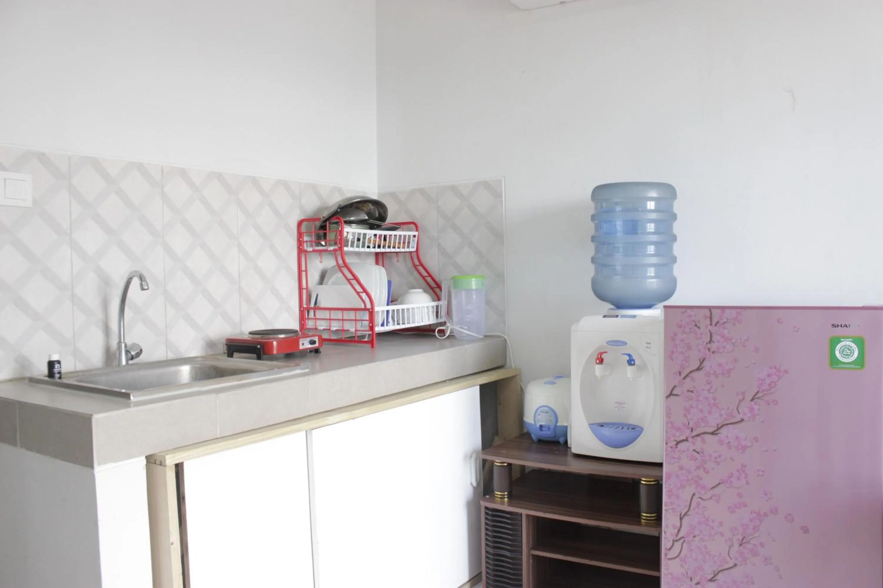 Comfy 2BR Apartment at Mekarwangi Square Cibaduyut By Travelio