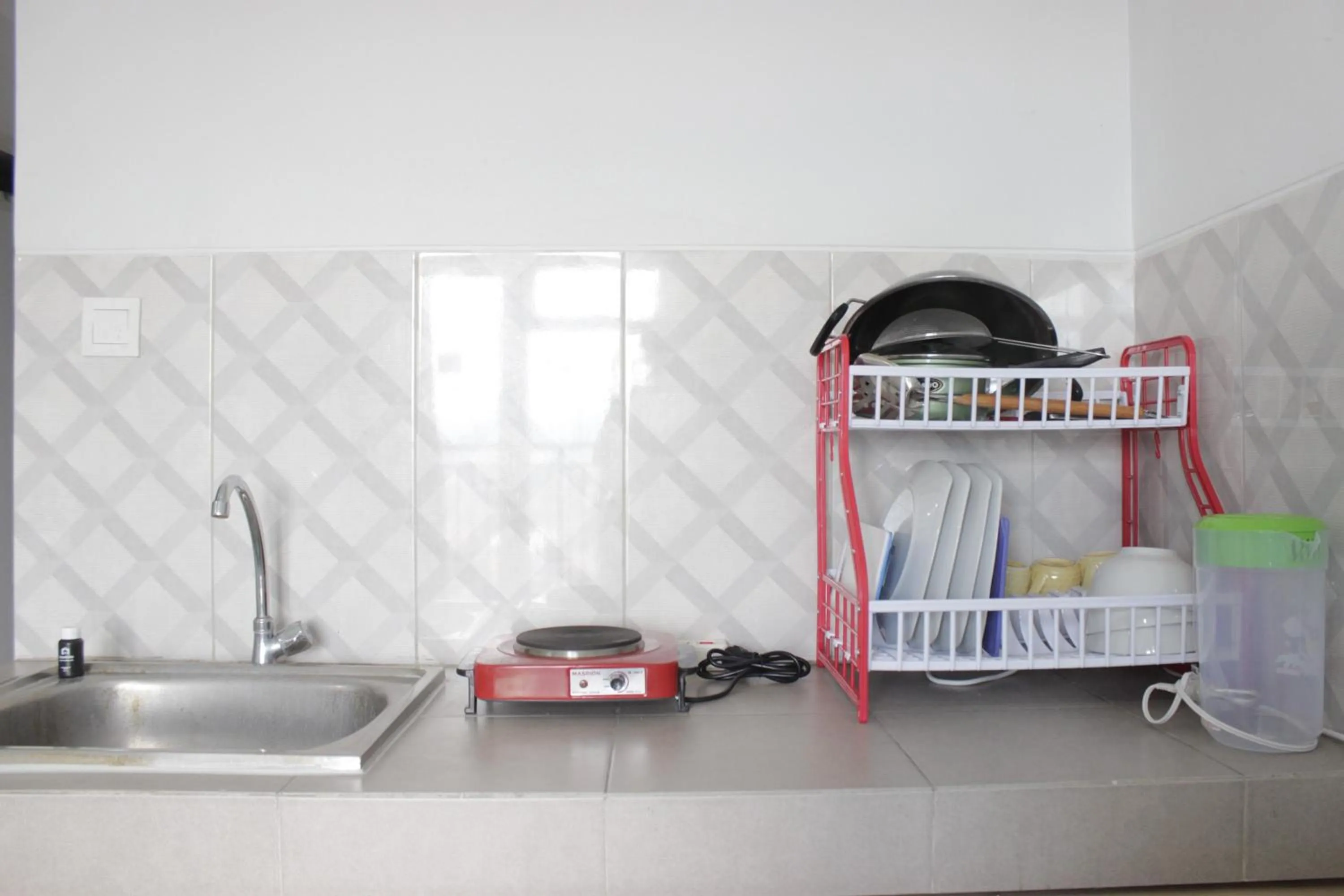 Comfy 2BR Apartment at Mekarwangi Square Cibaduyut By Travelio