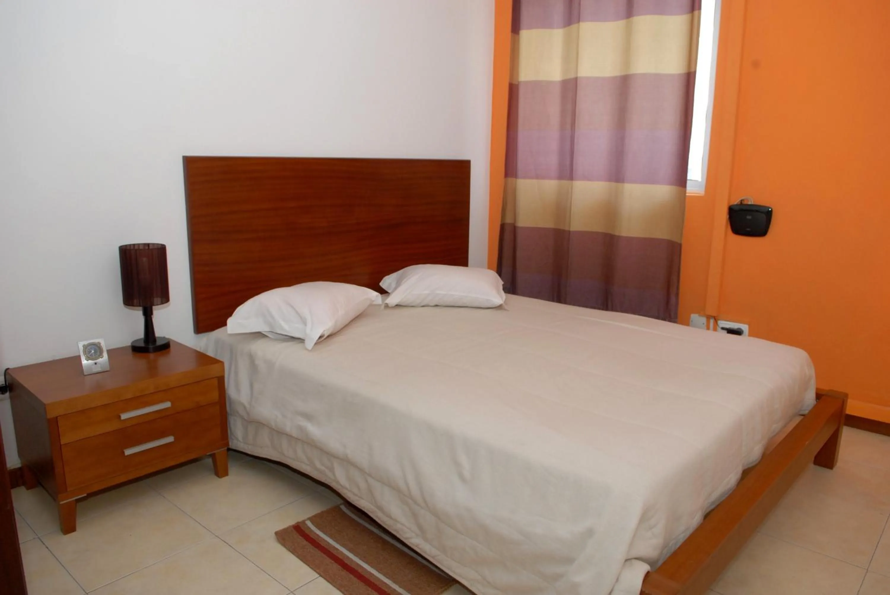Photo of the whole room, Bed in Apartamentos Santiago - Praia