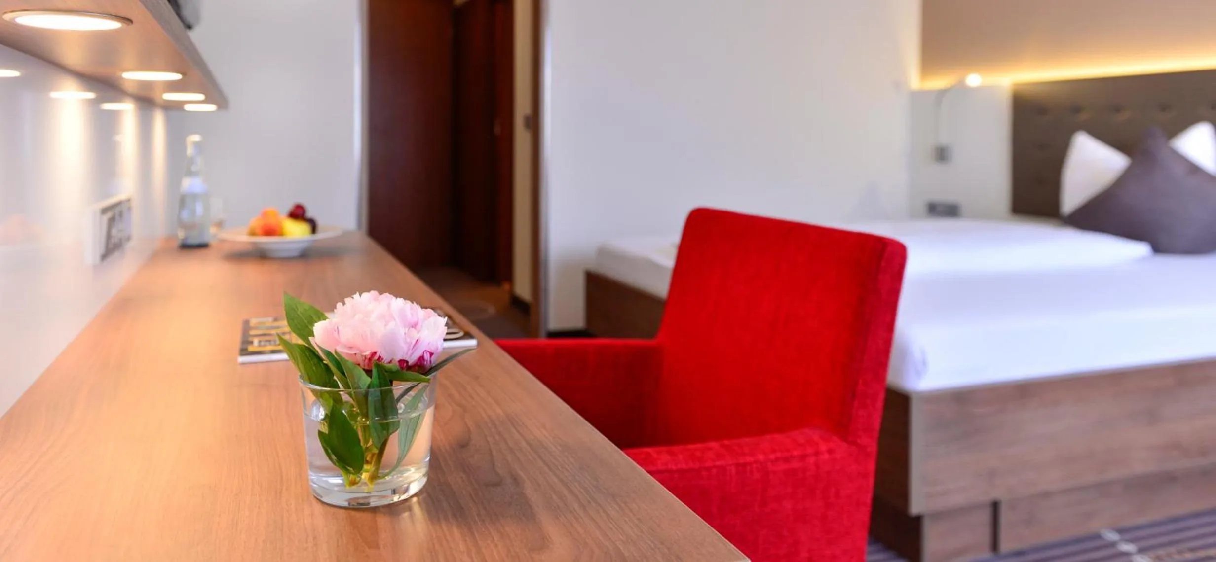 Seating area, Bed in Hotel Fuchsen