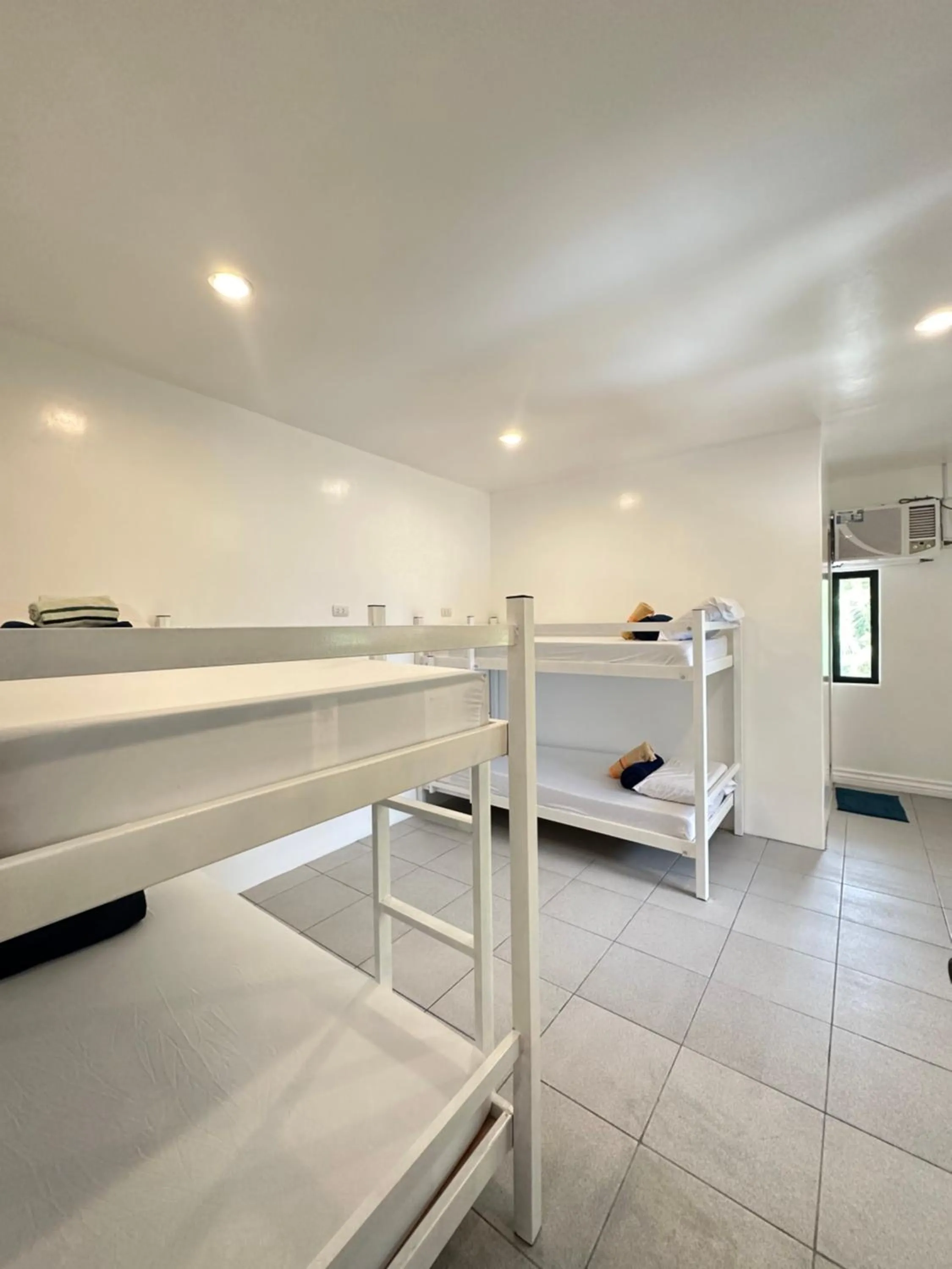 Bed in Gracey Dive Resort and Restaurant