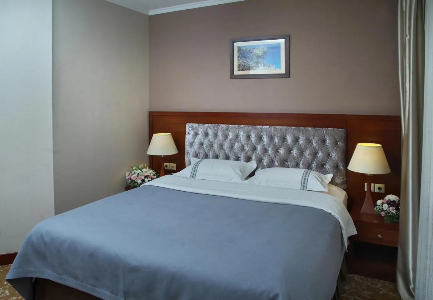 Bed in Grand Voyage Hotel