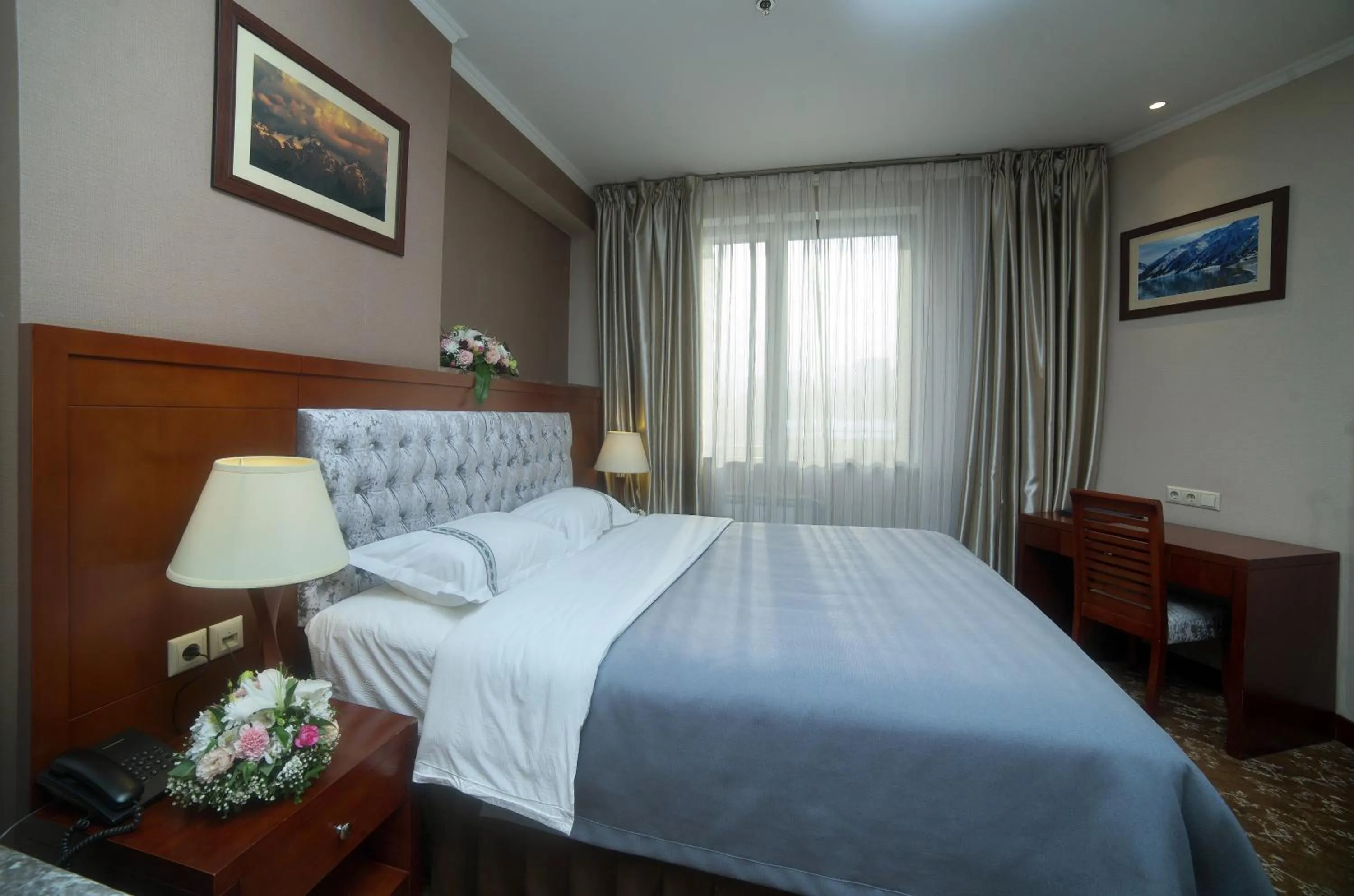 Bed in Grand Voyage Hotel