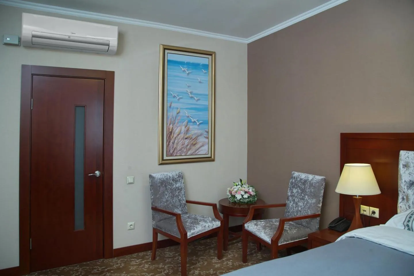 Living room, Bed in Grand Voyage Hotel