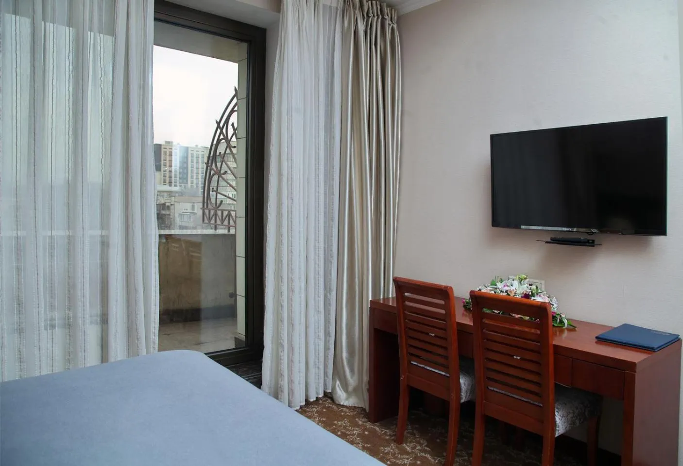 TV and multimedia, Bed in Grand Voyage Hotel