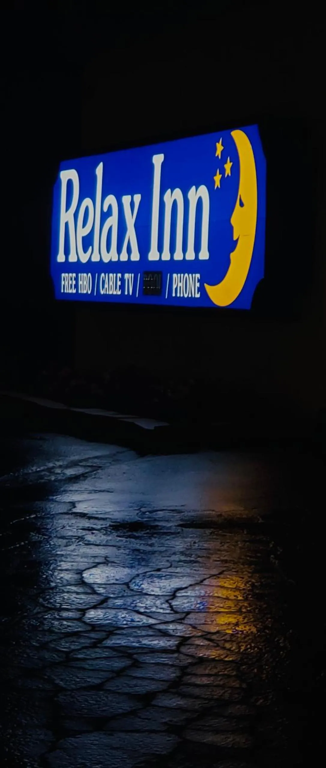 Property logo or sign in Relax Inn At Ashland
