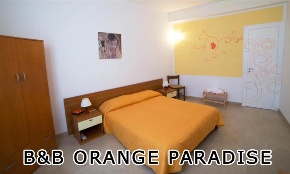 Bed in Orange Paradise b&b