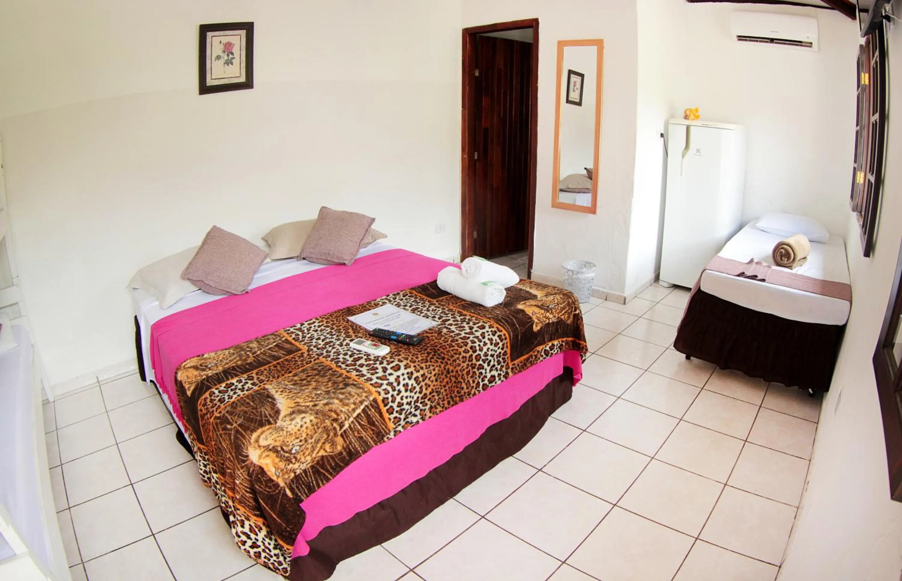 Bed in Pousada Sol e Mar