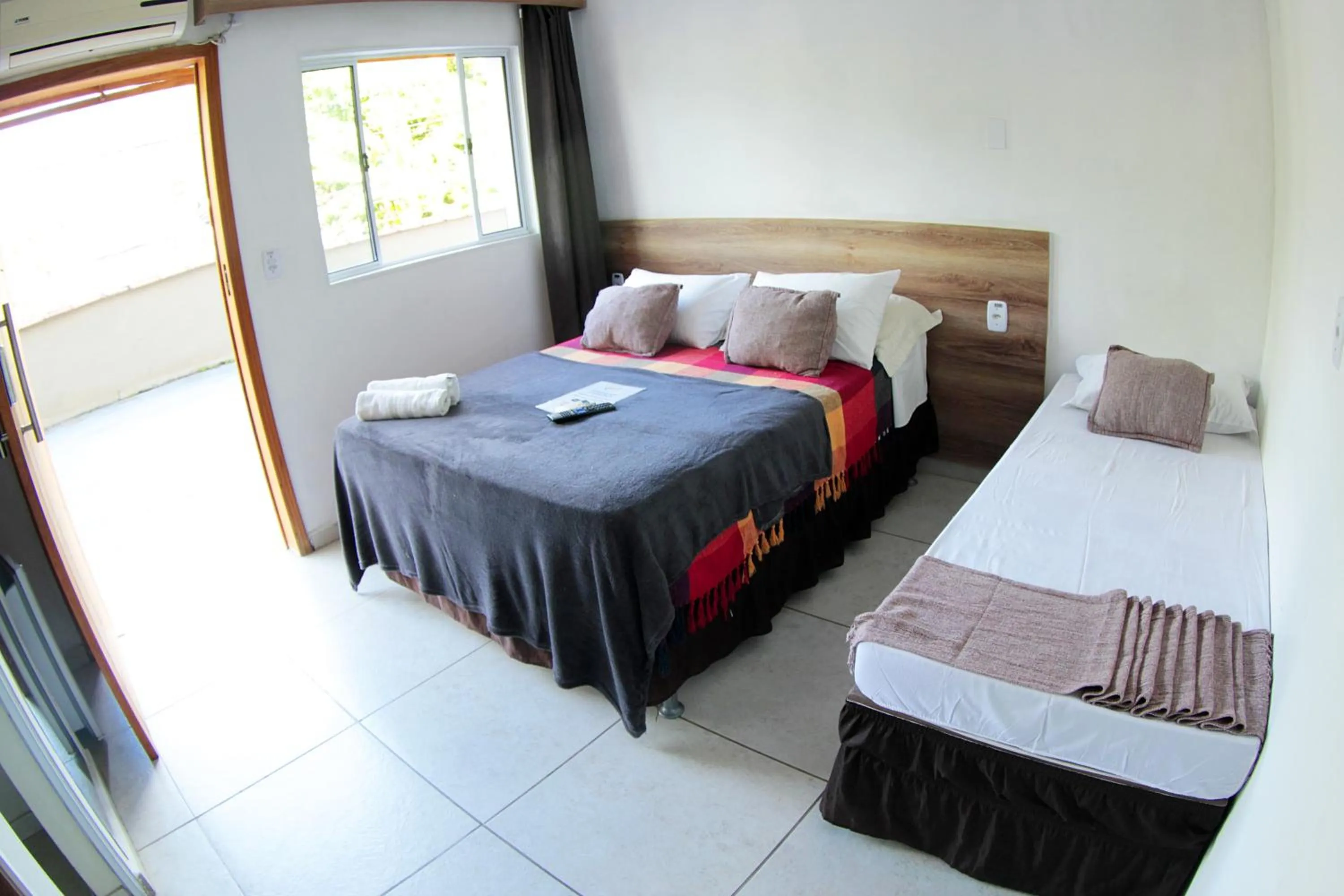 Bed in Pousada Sol e Mar