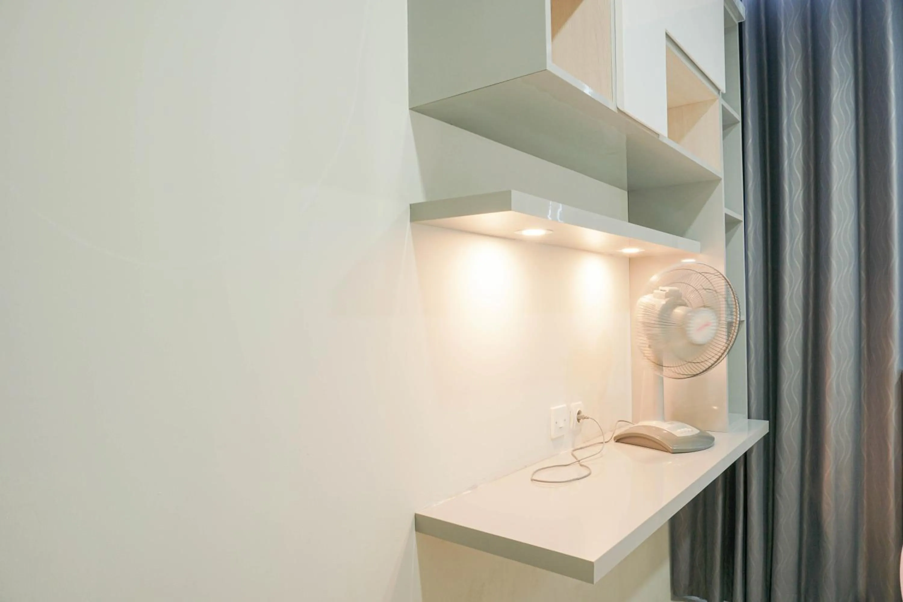 Bedroom in Fully Furnished with Comfortable Design 2BR Harco Mangga Besar Apartment By Travelio