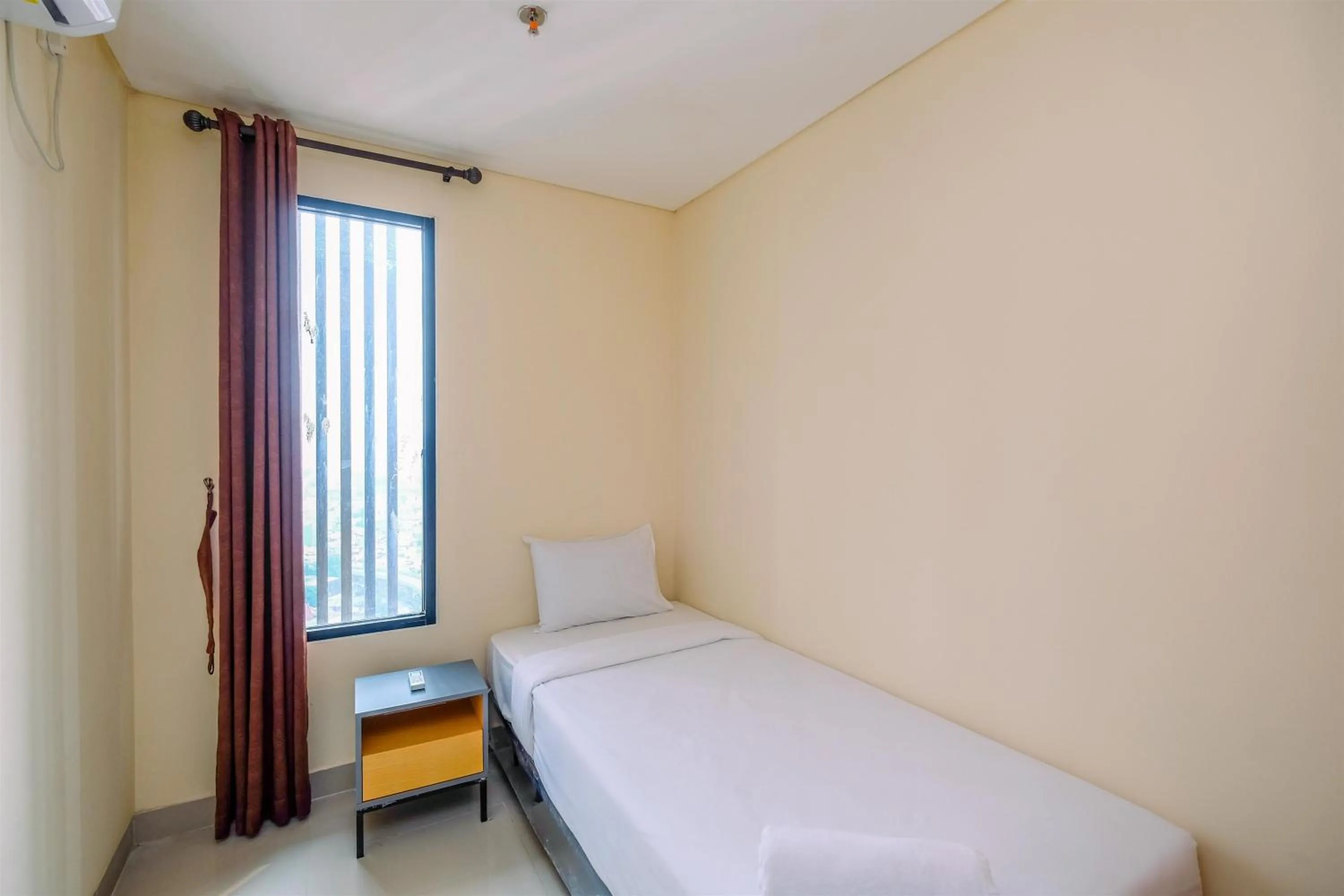 Bed in 2BR Best Rate Kebayoran Icon Apartment near Gandaria City By Travelio