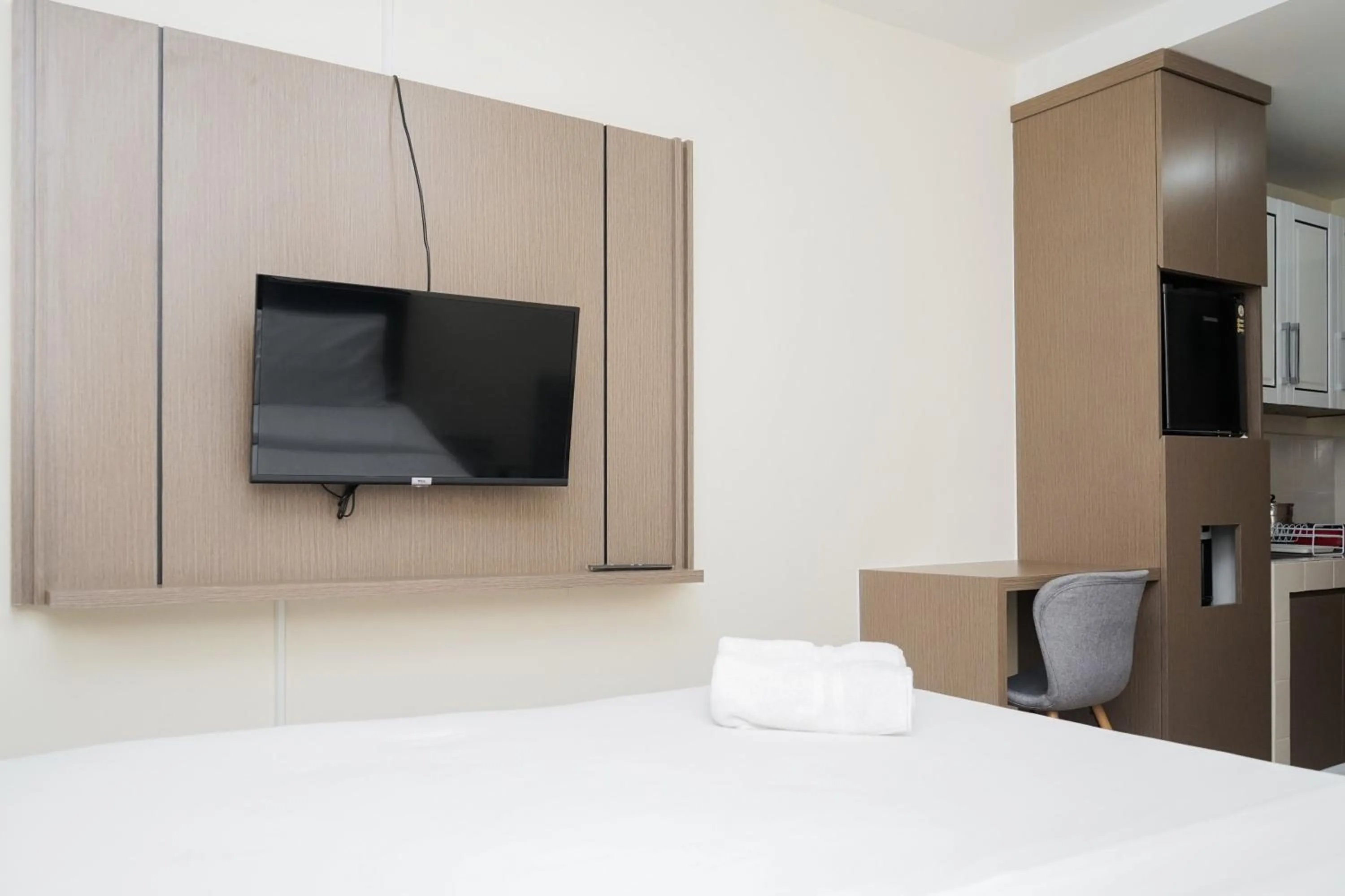 Bed in Homey and Comfact Studio at Medina Apartment By Travelio