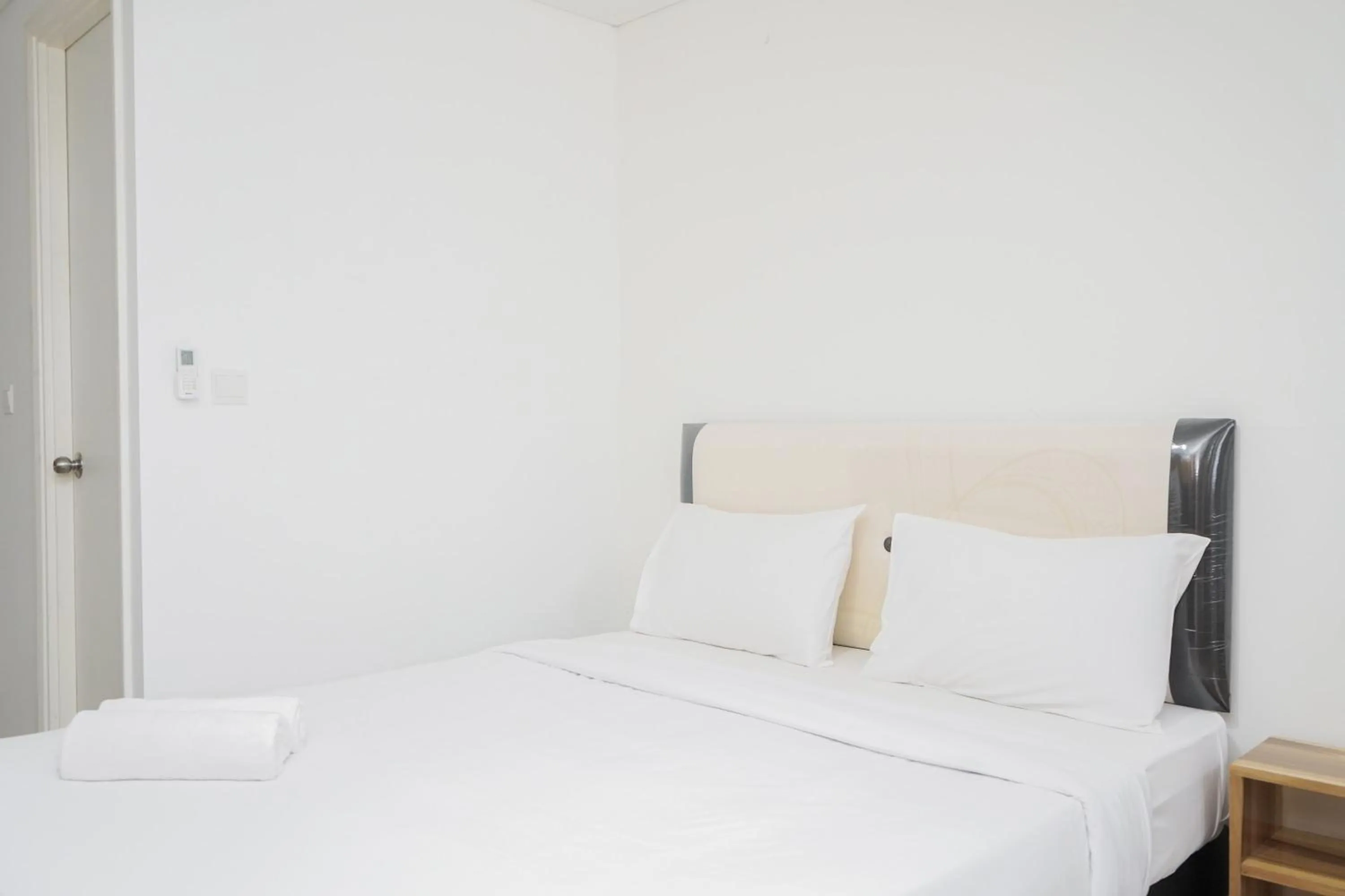 Bed in Functional Studio Apartment at Tuscany Residences BSD City By Travelio