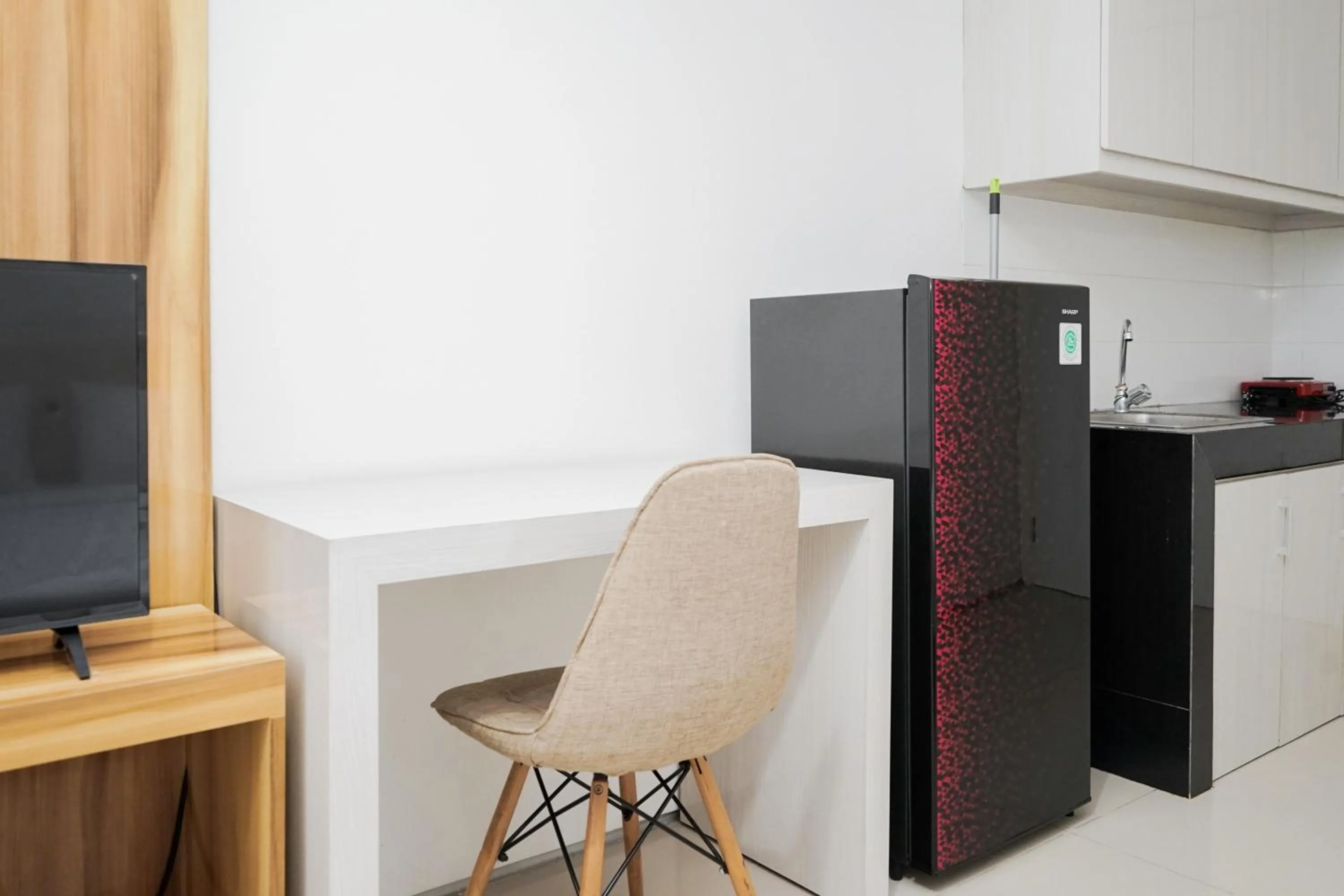 Functional Studio Apartment at Tuscany Residences BSD City By Travelio