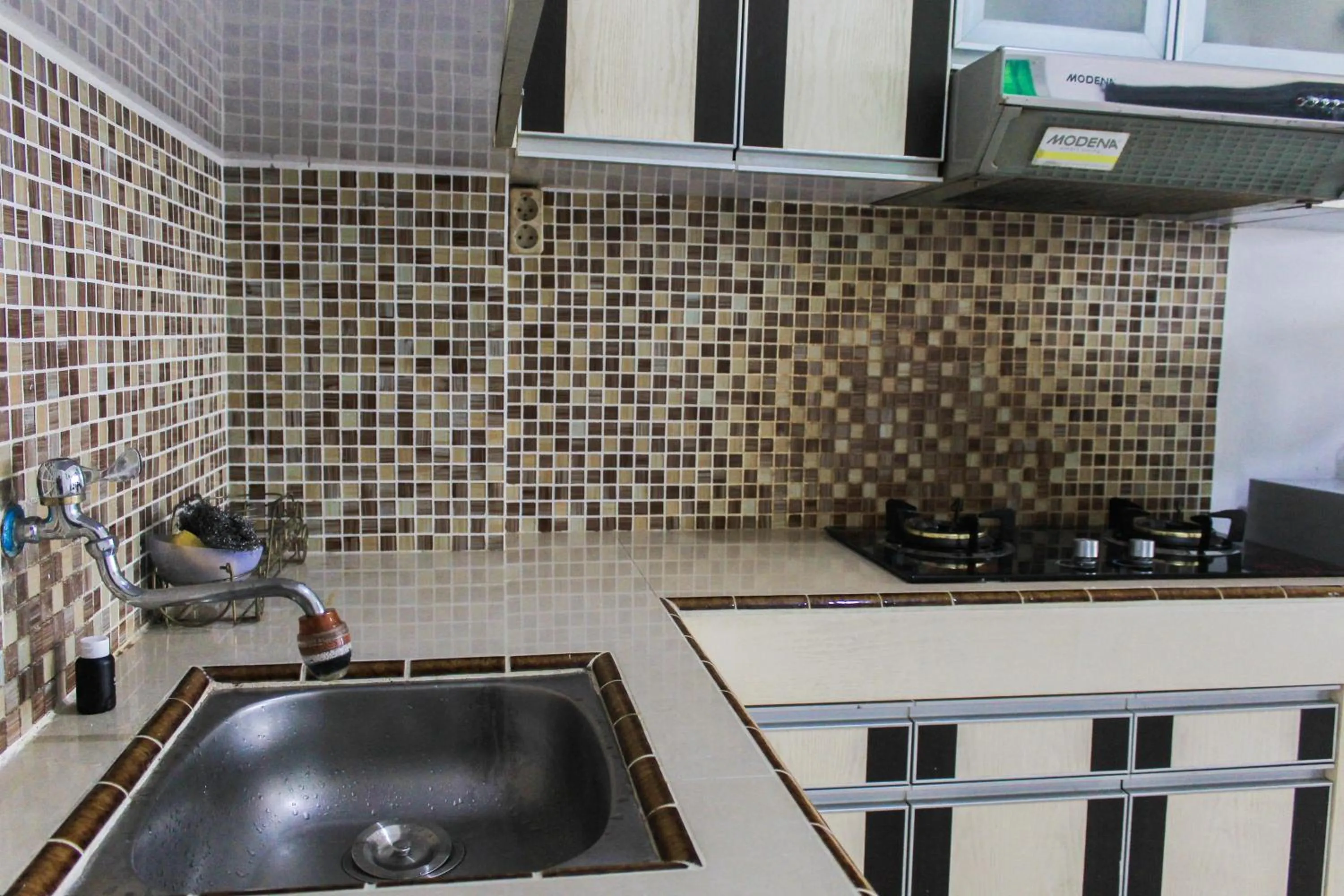 Best Price 1BR with Extra Room at Menara Latumenten Apartment Grogol By Travelio