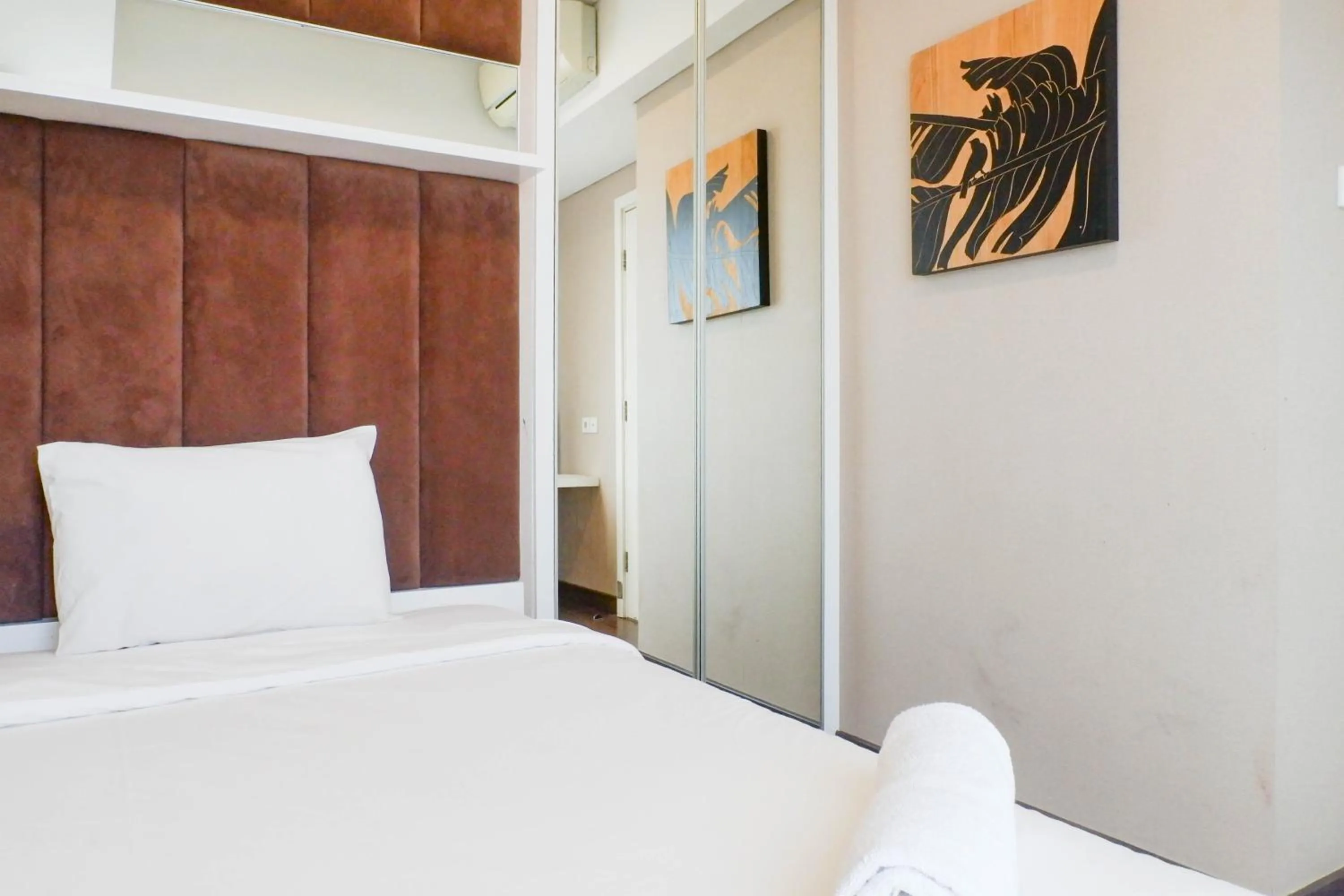 Bed in Scenic Modern 2BR Apartment at Trillium Residence By Travelio